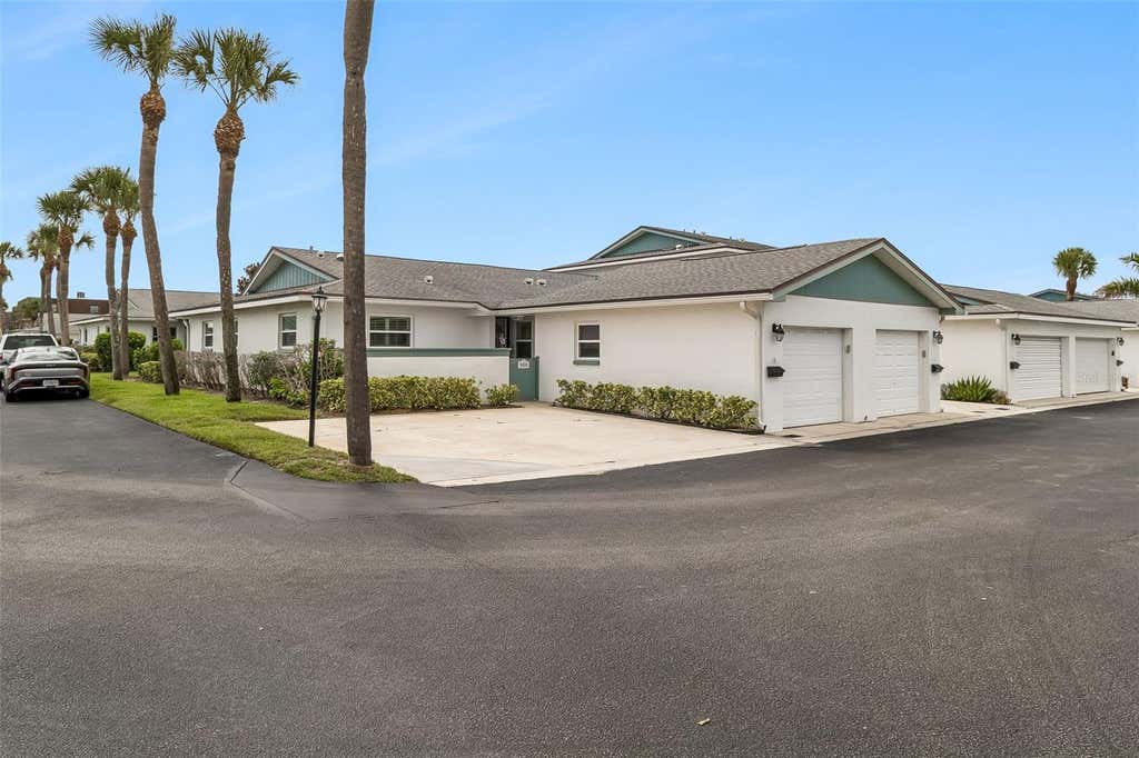 Photo of 290 Paradise Boulevard #13, Melbourne, FL 32903 (MLS # O6433207)