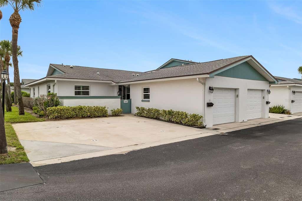Photo of 290 Paradise Boulevard #13, Melbourne, FL 32903 (MLS # O6433207)