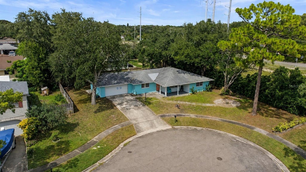 Photo of 505 Timber Lane, Tarpon Springs, FL 34689 (MLS # TB8542187)