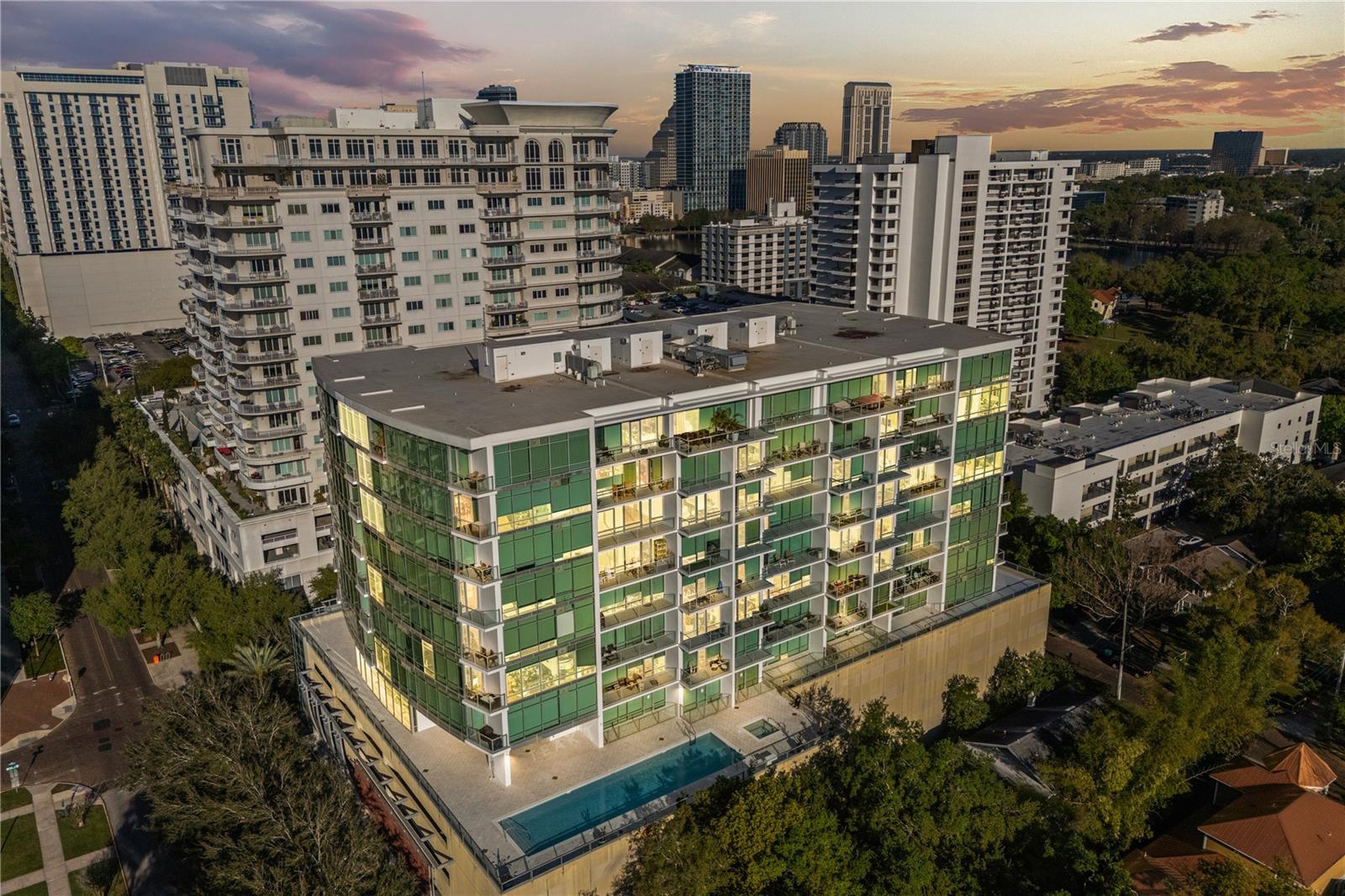 Welcome to Unit 1114 at 101 S Eola Drive, offering modern city living in the heart of Orlando’s sought-after South Eola neighborhood. This spacious 997-square-foot residence sits on the 11th floor of a boutique mid rise building and enjoys a west-facing exposure, providing a mix of city views overlooking neighboring buildings, bustling streets below, and glimpses of colorful sunsets from the oversized private balcony.
Inside, you’ll find one of the most desirable one-bedroom floor plans in the area, featuring a spacious bedroom, a versatile den perfect for a home office or guest space, a full bathroom, and a convenient half bath for visitors. The sleek kitchen is equipped with stainless steel appliances and flows seamlessly into the open living and dining areas, creating a comfortable atmosphere for both relaxing and entertaining.
Additional highlights include one assigned secure parking space and access to excellent building amenities. The building also features a brand-new saltwater pool that is awaiting final city permit approval before opening for residents’ use, adding even more lifestyle appeal to this urban retreat. Step outside and enjoy a short walk to Publix, the downtown business district, Dr. Phillips Performing Arts Center, and the incredible array of restaurants, bars, and entertainment venues that make Thornton Park and Downtown Orlando so vibrant.
Don’t miss your chance to live in the center of it all — schedule your private tour today!