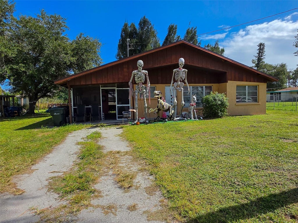 Photo of 845 Palm Avenue, Englewood, FL 34223 (MLS # C7532481)