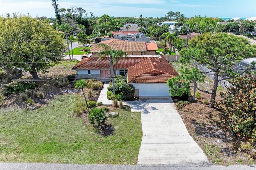 A rare opportunity west of Harbor Drive on the Island of Venice, just four blocks to a private beach and not located in a flood zone. This is the kind of property that almost never comes available. Set on an oversized, maturely landscaped corner lot surrounded by newer luxury homes, this is your chance to step into one of Venice Island’s most sought-after pockets with flexibility to enjoy, renovate, or build something truly exceptional.
Imagine starting your mornings with coffee in hand, the sound of birds chirping as the island wakes up around you. A short walk or golf cart ride takes you to your private neighborhood beach, where soft sand and Gulf waters set the tone for your day. Evenings are just as special - warm coastal breezes, glowing sunsets to the west, and the kind of peaceful setting that makes Venice Island living so unique.
The existing home offers a spacious, open layout with two en-suite bedrooms, along with both a separate family room and living area, creating flexibility for everyday living or hosting guests. Step outside to a 12x19 covered lanai and an additional 12x13 patio, perfectly positioned to capture both southern exposure and those coveted west-facing sunset views. With over a quarter-acre lot (104x113), there is ample room to add a pool or completely reimagine the property.
Surrounded by new construction, this homesite presents a compelling opportunity, whether you choose to renovate the current residence or build a custom home to today’s standards in a location that fully supports it.
Located within a private beach community, residents enjoy exclusive access just four blocks away, along with the charm and convenience of Historic Downtown Venice only one mile from your door. The area is golf cart and bicycle friendly, with easy access to waterfront dining, multiple public beaches, golf courses, tennis and pickleball courts, and scenic trails including the Island Loop and Venetian Waterway Trail connecting to the Legacy Trail.
With no CDD fees and an optional HOA of just $50 per year, this is a rare blend of location, lifestyle, and long-term upside - right in the heart of Venice Island. 2454 total sq cottage. One or more photos have been virtually staged.