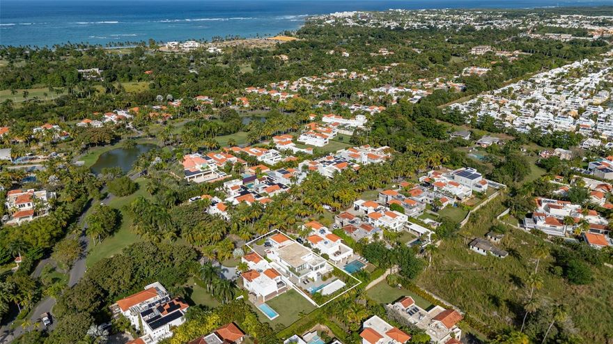 Discover refined modern living in this fully renovated Dorado Beach East residence, offering 6,625 sq ft. of beautifully reimagined interiors and exceptional outdoor spaces. Set on a 1,152 sq mt. lot, this two-story home features 6 bedrooms, 8 baths, and a seamless blend of high-quality construction with contemporary design. Completely redesigned the home showcases a modern chef’s kitchen, elegantly updated bathrooms, expansive living areas, and refined finishes throughout. Outdoors, enjoy resort-style living with a stunning pool and jacuzzi, multiple covered terraces, an open paved patio, exterior bath and shower, and lush surroundings ideal for entertaining. Additional features include a golf cart garage, generator, water cistern, and water heater. Located within the gated and highly coveted Dorado Beach East community, this turn-key property offers unparalleled comfort, privacy, and elevated Caribbean living.