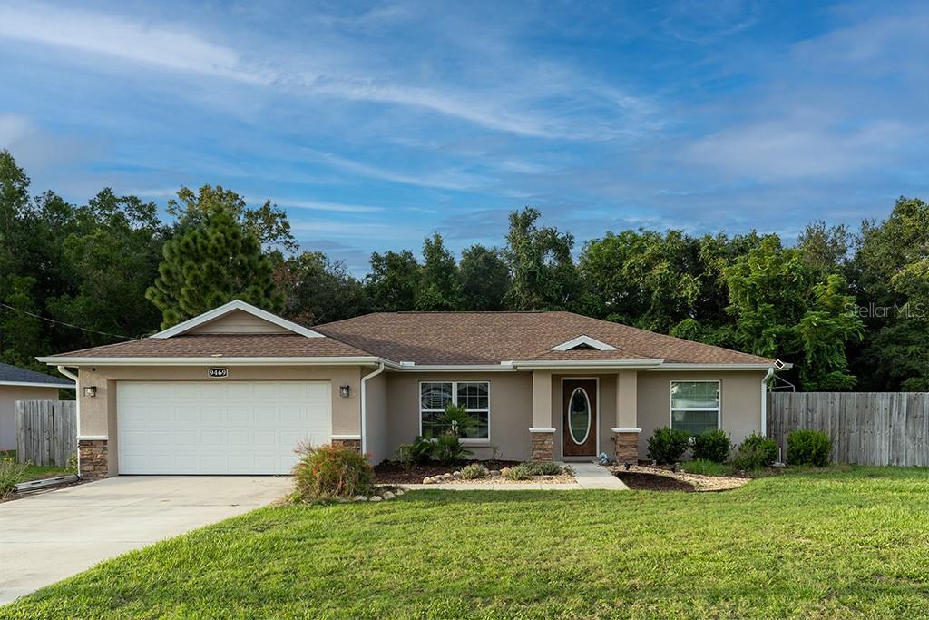 Welcome to this beautiful 3 bedroom, 2 bathroom home perfectly situated on an expansive corner lot in the highly sought-after Orange Blossom Hills neighborhood. Inside, you’ll love the split floor plan that offers privacy and functionality. The kitchen features granite countertops and plenty of cabinet space, making it a chef’s delight. The home also boasts custom built-in furnishings, adding style and convenience. Step outside to enjoy the spacious backyard, complete with a storage shed and privacy fencing—perfect for pets, entertaining, or weekend projects. This home is centrally located between Ocala and The Villages- just minutes from shopping, dining, and everyday conveniences. Don’t miss the chance to make this charming house your new home. Schedule your showing today!