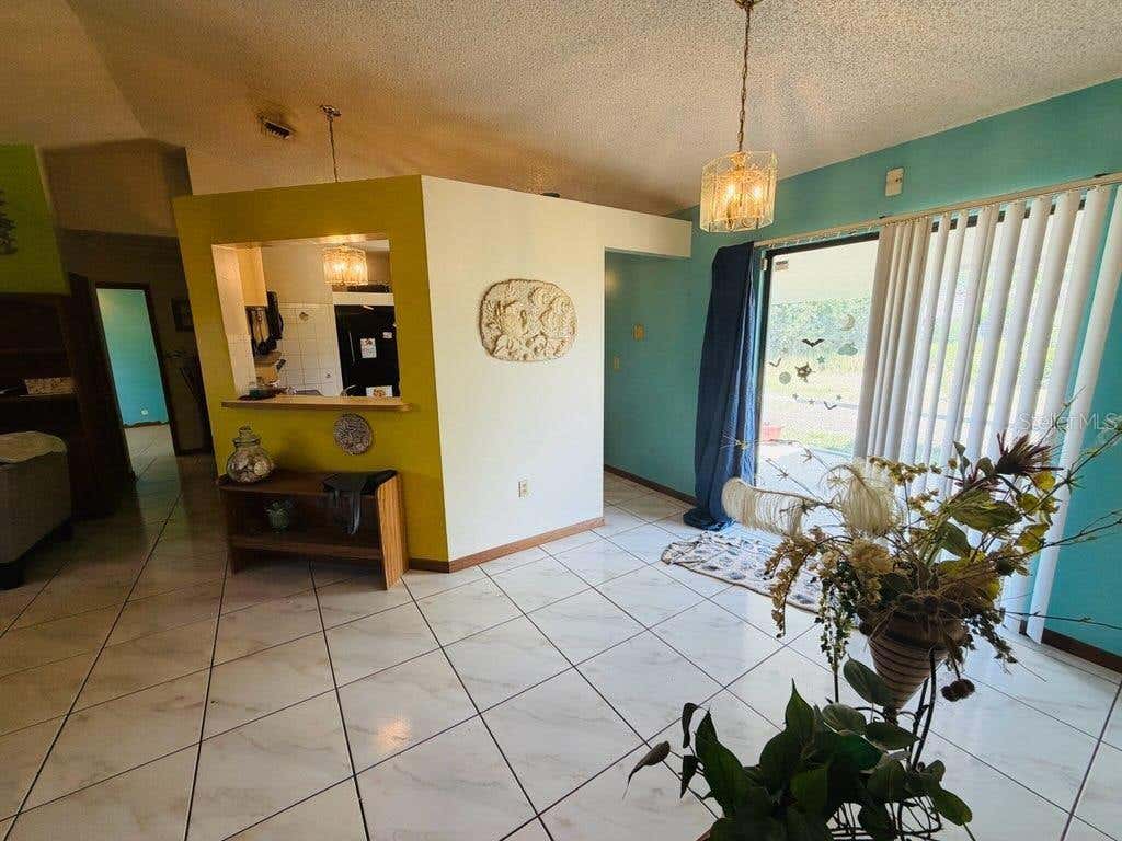 Photo of 450 Topeka Rd, Palm Bay, FL 32908 (MLS # O6417109)