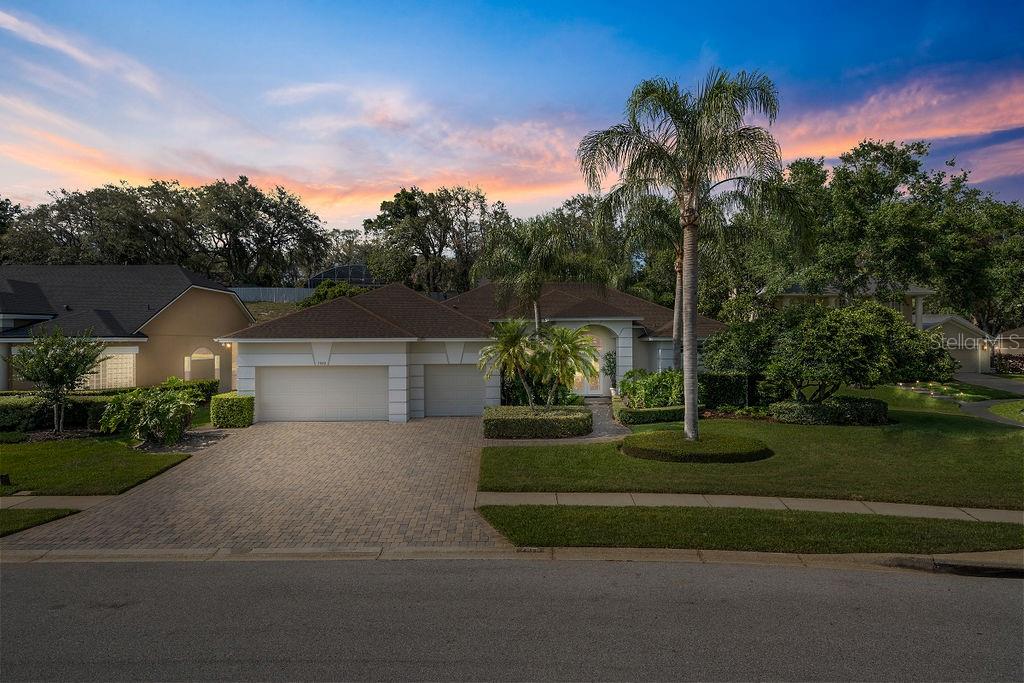 Welcome to the serene oasis. As soon as you come into the home, you are welcomed in the beautiful foyer and sitting room with its 12- and 10-foot ceilings, walnut hardwood flooring, unique built-in pieces and the amplitude of natural light that comes in through your large windows with the peaceful view overlooking your private pool. Continuing through the home you come into the master suite that features items such as walnut hardwood flooring, two enormous walk-in closets with custom closet organizers, your private exit to the pool and remote-controlled blackout shades that allow you to unwind and relax from a hard day's work. Your primary bathroom features dual sink vanity, a new primary bath glass shower enclosure and your tub to enjoy those quiet evenings. Continuing through the home you will come to the spectacular kitchen, perfect for those who love to entertain friends and family. This kitchen features items such as 42-inch cabinets, stainless steel appliances, under-counter/over-counter lights, exotic blue eye granite, slate backsplash, soft-close drawers, instant hot water faucets, reverse-osmosis water system and so much more. With its split floor plan, the additional three well-spaced bedrooms, provide the privacy that you need from the master suite. In addition for those seeking a peaceful and healthy lifestyle, this home provides you with a spectacular 414-square-foot bonus room. Perfect for an in-home gym, dance studio or just your private space to take a breather and let your creativity flow. Continuing onto the exterior it is time to enjoy the Florida lifestyle with your private saltwater pool and your enormous secluded backyard. And to top it all off, you could not be in a better location, minutes away from the center of Dr. Phillips, Restaurant Row, International Drive, all the major highways and expressways and most importantly, parks and nature trails to let you enjoy your life. All that’s missing is you. Contact your REALTOR® today for a private showing.
