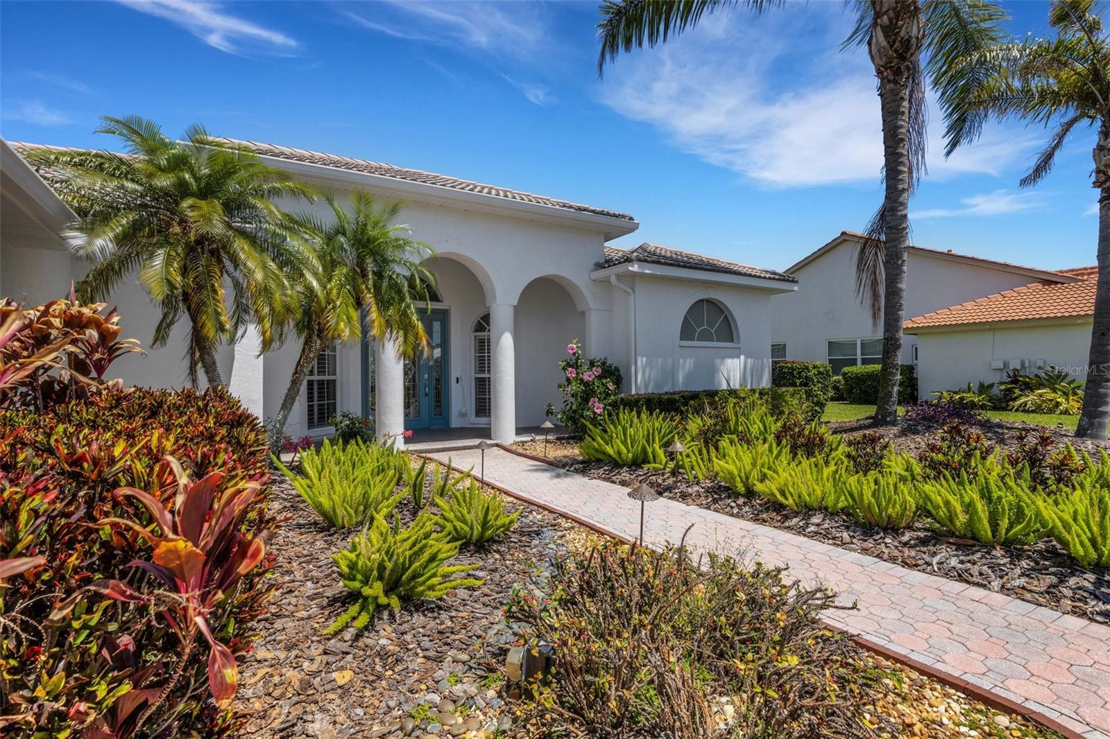 Executive Home in a Distinguished Gated Golf Course Community. Discover refined living in this beautifully maintained single-family home. Located just 7 miles from the world-renowned Siesta Key Beach and only 10 miles to the vibrant arts, dining, and culture of downtown Sarasota, this exceptional property combines resort-style living with unbeatable convenience. This spacious residence offers 3 bedrooms plus a versatile den, along with 2.5 baths, perfect for accommodating family and guests. Enjoy elegant entertaining in the formal living room and formal dining room, complete with a convenient wet bar. The inviting family room seamlessly flows into an eat-in kitchen with an abundance of cabinetry, creating a comfortable gathering space at the heart of the home. Step outside to your private retreat featuring a sparkling pool and relaxing spa—ideal for Florida’s sunny days and tranquil evenings. Additional highlights include a freshly painted interior and exterior, a 2-car garage, and mature landscaping that enhances the home’s curb appeal. As part of the Palmer Ranch Stoneybrook community, residents have access to a championship golf club that offers full dining options, perfect for casual lunches or elegant dinners. Additional amenities include tennis courts, a community pool, a modern fitness center, and beautifully maintained grounds that enhance the resort-style living experience. Home has brand new heating, ac and water heater. Don’t miss the opportunity to make this stunning Palmer Ranch Stoneybrook home yours!