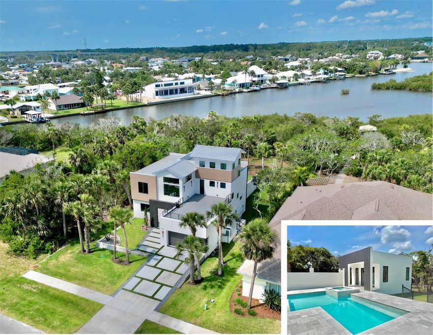 Stunning New 3-Story Coastal Pool Home with Casita in Flagler Beach, FL.
Welcome to your dream coastal retreat in beautiful Flagler Beach! This brand-new, architecturally designed 3-story home offers luxury living at its finest with 4 spacious bedrooms, 4.5 elegant bathrooms, plus an inviting private casita—perfect for guests or a home office.

Inside, the home features high ceilings, solid-core doors, and designer finishes, including quartz countertops, Kohler fixtures, and top-of-the-line Thermador appliances in a chef-style kitchen. Impact-rated windows and doors provide storm protection and peace of mind, while a 250-gallon underground gas tank powers a full house generator, ensuring comfort in any weather. The Primary bedroom is on the 1st floor with 3 guest rooms with their own bathrooms on the 2nd floor. INCLUDING CASITA THIS PROPERTY HAD 5 BEDS AND 5.5 BATHS! Casita ads another 412' sf of living space to total 3446' sf.

Smart home amenities include a WiFi-enabled exterior camera system, Sonos Sound System, integrated security system, and landscape lighting that enhances both security and curb appeal.

Step outside to your resort-style travertine tiled pool area, complete with jacuzzi, two outdoor showers, multiple entertainment decks, and a rooftop deck offering breathtaking imtracoastal and ocean views. For boating enthusiasts, the home includes a private dock with a boat lift, providing easy access to the Intracoastal and beyond.

Whether you're entertaining, relaxing by the pool, or enjoying the sea breeze from your rooftop oasis, this home delivers a rare combination of luxury, functionality, and coastal charm in one of Florida’s most picturesque beach towns.