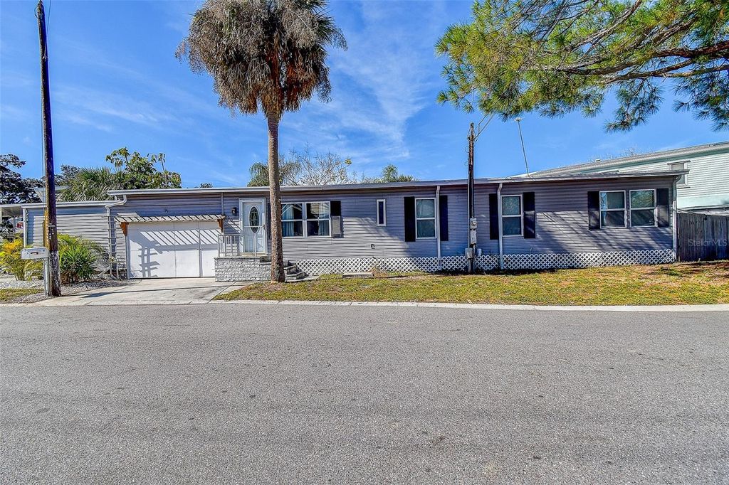 Photo of 505 Riverview Lane, Tarpon Springs, FL 34689 (MLS # TB8466959)
