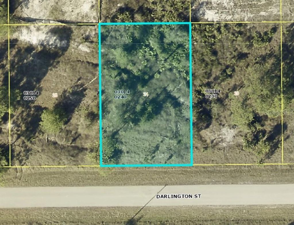 Photo of 1035 Darlington Street, Lehigh Acres, FL 33974 (MLS # C7507927)