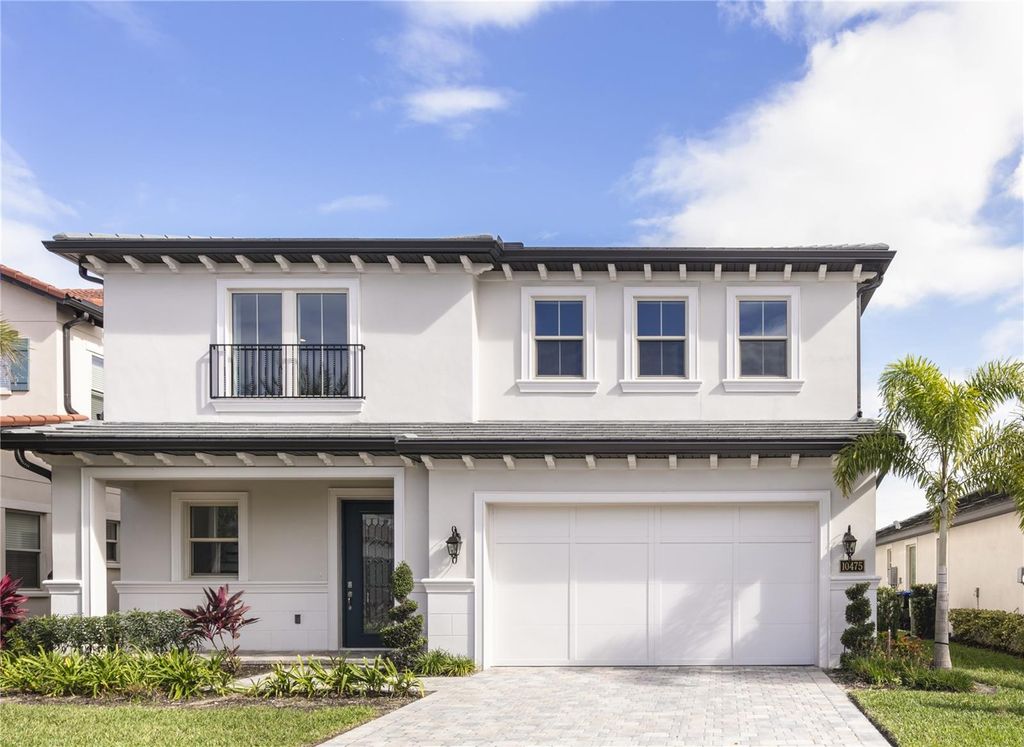 Photo of 10475 Royal Cypress Way, Orlando, FL 32836 (MLS # O6390187)