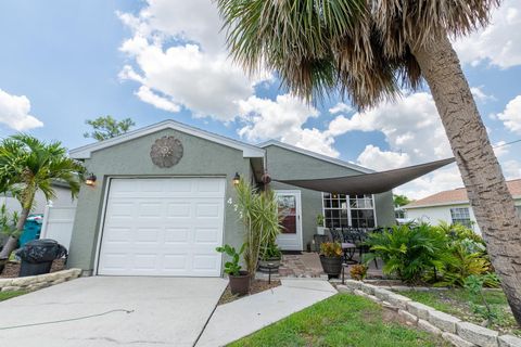 Photo of 477 Ricold Terrace, Port Charlotte, FL 33954 (MLS # C7511301)
