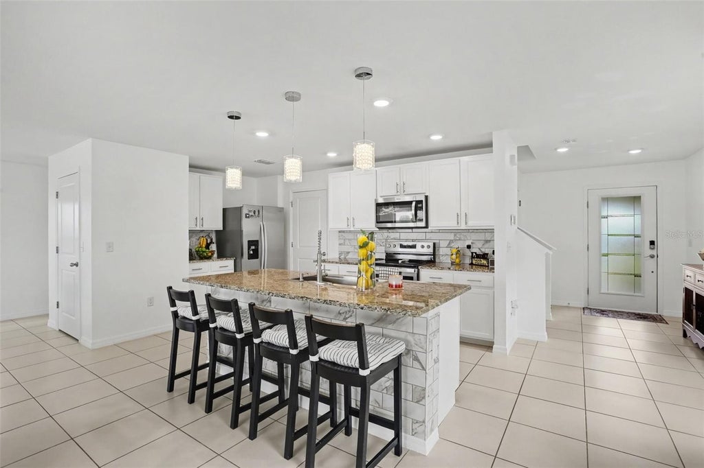 Photo of 498 Olive Conch Street, Ruskin, FL 33570 (MLS # TB8546367)