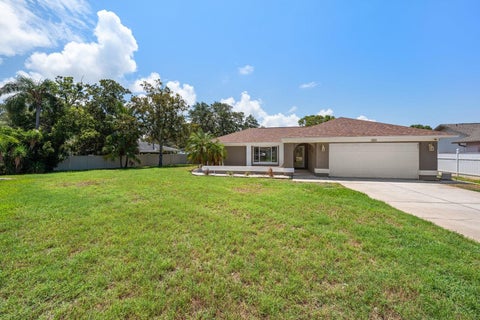 Photo of 1301 Lily Court, Tarpon Springs, FL 34689 (MLS # TB8525143)