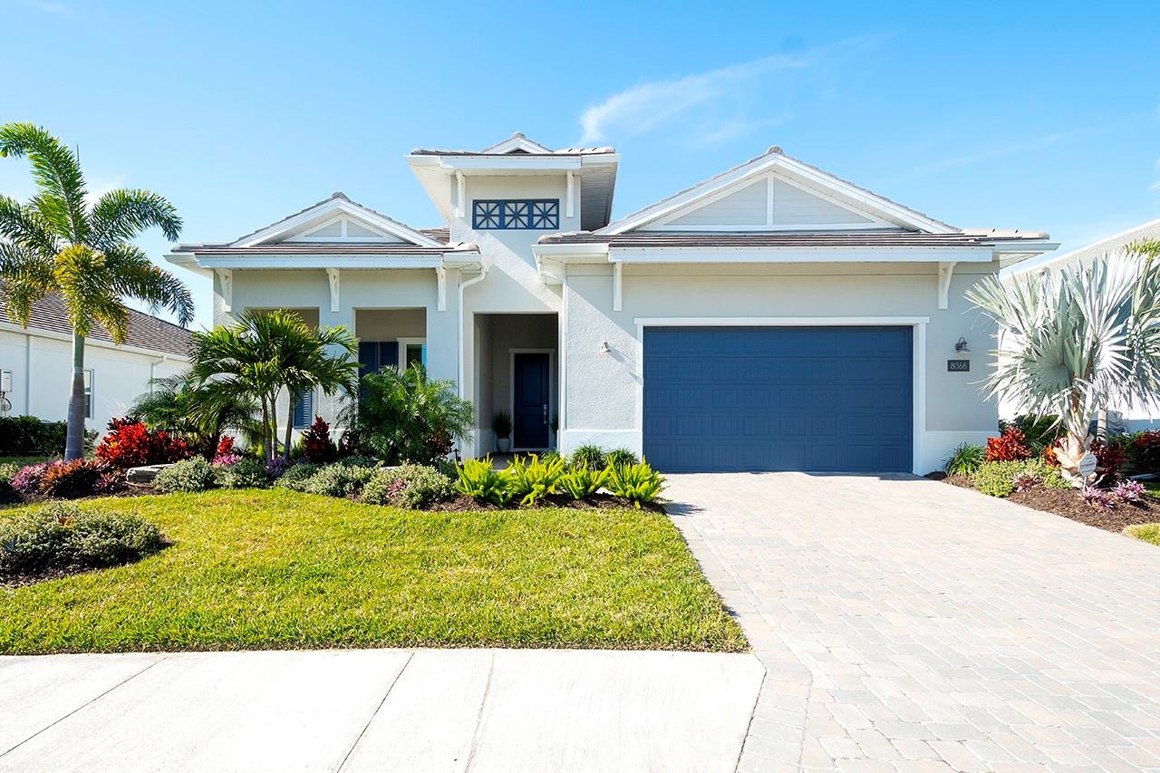 WOW!! You'll love the 51K price improvement!! This 3-bedroom, 3-bathroom home spans 3,022 square feet and is located on an oversized lot with picturesque views of a serene preserve, offering privacy and a stunning natural backdrop.
Ceramic tile floors run throughout the home, creating a cohesive and low maintenance living space. The expanded great room and dining room features beautiful, coffered ceilings with shiplap and beams, adding a touch of architectural elegance, while designer chandeliers enhance the sophistication of both the great room and dining area.
The alternate kitchen layout is a chef’s dream, featuring sleek quartz countertops and marble backsplash, 5 burner gas stove, walk in pantry and a spacious design perfect for entertaining. A tankless water heater and hurricane impact windows and doors provide modern efficiency and peace of mind. A central vacuum system is built in which is designed to make household chores easier.
The primary suite is a luxurious retreat with a large walk in closet, a spa-like bathroom, featuring recessed shower niche, rain shower head, as well as standard shower fixture and dual sinks.
The second bedroom offers an en-suite bathroom, ideal for guests or family members seeking comfort and privacy. A home office with a view of the preserve provides a tranquil space for work or relaxation.
Outdoor living is exceptional with a welcoming front porch, a screened-in back porch for year-round enjoyment, and a fully equipped outdoor kitchen perfect for entertaining featuring a grill, refrigerator, sink and a tranquil view of the pond and preserve.
Located in an amenity -rich community, residents of The Isles at Lakewood Ranch enjoy access to a resort-style pool, along with lap lanes, clubhouse, fitness center, tennis and pickleball courts, and scenic walking and biking trails. This exceptional residence seamlessly blends luxury, functionality and natural beauty, offering an unparalleled lifestyle in a truly
breathtaking setting. Don't miss this incredible opportunity to own a beautifully upgraded home in The Isles!