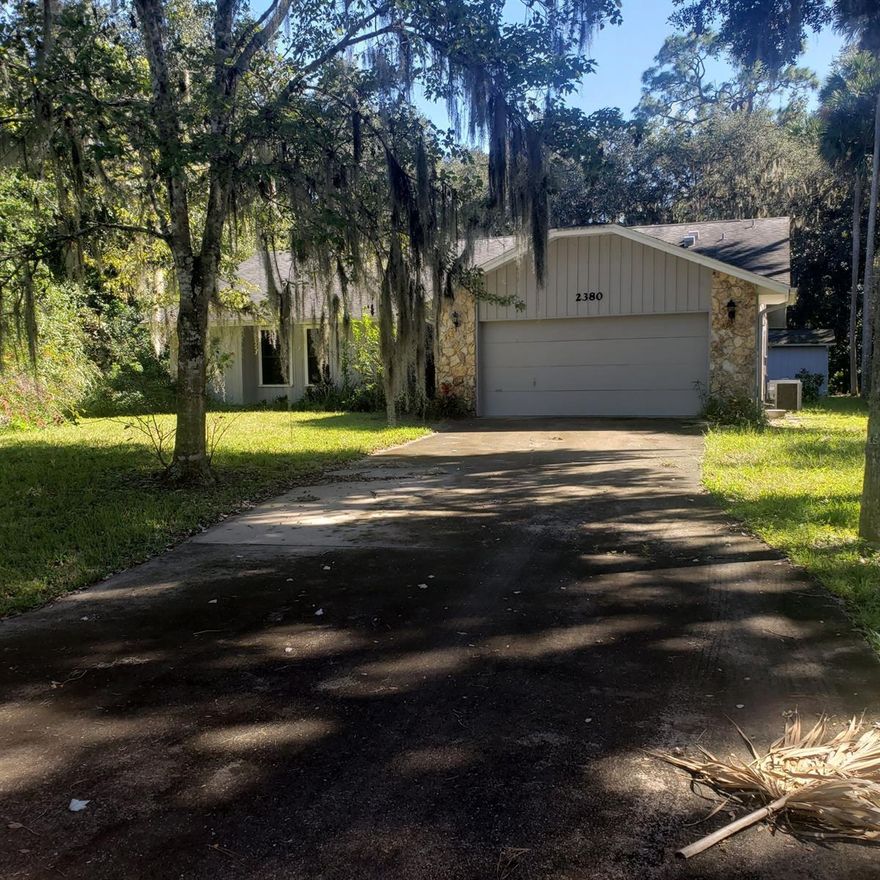 Neighborhood of well kept homes on very large lots. This house is in need of complete remodeling. Pool is in good condition. Florida Room has half bath