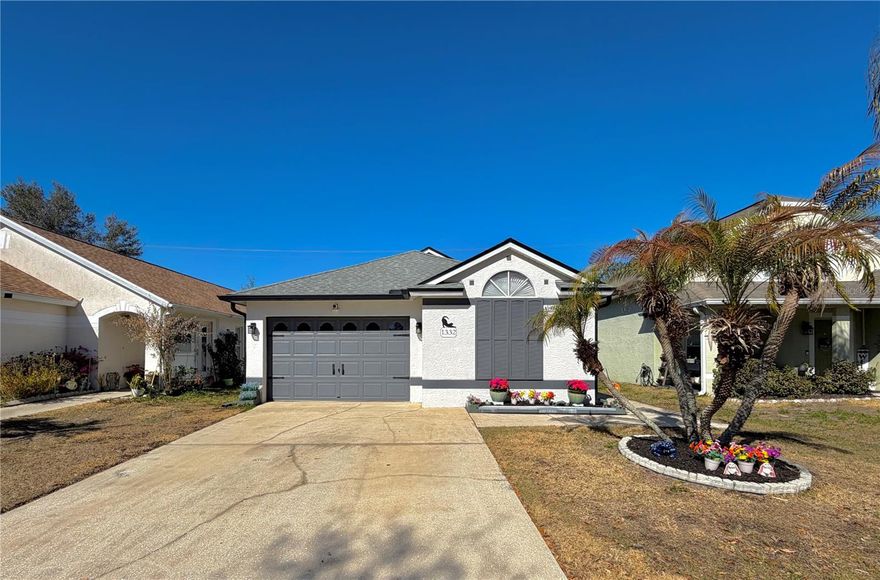 Welcome to your dream home in the heart of Brentwood Hills, where resort-style living meets effortless convenience in one of Valrico's most sought-after communities! Step inside this beautifully maintained 3-bedroom, 2-bathroom gem and immediately feel the warmth of a home that's been lovingly cared for and gorgeously updated. Fresh, newer paint and flooring throughout create a bright, airy atmosphere that floods every room with natural light, making the entire space feel open, inviting, and move-in ready. Large windows frame peaceful neighborhood views while enhancing the cheerful ambiance inside. The thoughtfully designed floor plan offers both functionality and comfort, with spacious living and dining areas that flow seamlessly together, ideal for hosting gatherings or enjoying quiet evenings at home. The kitchen opens effortlessly into the main living space, creating a natural hub for connection, conversation, and everyday living. Whether you're preparing weeknight dinners or entertaining guests, the layout makes it easy to stay part of the action. The primary suite offers a private retreat, complete with generous closet space and a well-appointed en-suite bath designed for relaxation. The additional bedrooms are perfectly sized for family members, guests, a home office, or even a fitness space—giving you flexibility to adapt the home to your lifestyle needs. Every inch of this property reflects pride of ownership and careful attention to detail. And here’s where this home truly stands apart — it features solar panels that will be completely paid off at closing by the seller, providing the new owner with immediate long-term savings and energy efficiency without taking on any additional loan or lease. These panels significantly reduce monthly electric costs, often lowering utility bills by a substantial amount while also increasing the home's overall energy efficiency and value. It’s a smart investment already made for you — allowing you to enjoy lower operating costs and greater financial peace of mind from day one. One of the standout lifestyle benefits? Minimal yard maintenance. No endless weekends spent mowing or weeding. Instead, spend your free time enjoying the community's incredible community amenities: a sparkling pool with Jacuzzi jets, covered pavilions with grills for BBQs, tennis and pickleball courts, basketball court, horseshoe pit, playgrounds with rubber mulch for added safety, a dog park for your four-legged family members - Brentwood Hills truly delivers an active, connected lifestyle. Location? Unbeatable. Nestled in Brentwood Hills, you're just minutes from major employers, shopping at Brandon Town Center and Westfield Brandon Mall, grocery stores, top-rated schools, restaurants, medical facilities, and everyday conveniences. Commuting is simple with quick access to I-75, SR 60, and US-301. Tampa, Riverview, Plant City, and MacDill Air Force Base are all within easy reach, making this home an ideal option for professionals, military families, growing households, or anyone seeking both accessibility and comfort. This home isn't just a house - it’s the perfect blend of modern updates, low-maintenance living, energy-efficient savings, vibrant community perks, and prime location that truly checks every box. Whether you're upsizing for growing needs, downsizing for easier living, purchasing your first home, or investing in a turnkey property, 1332 Dew Bloom Rd feels like it was made for YOU!