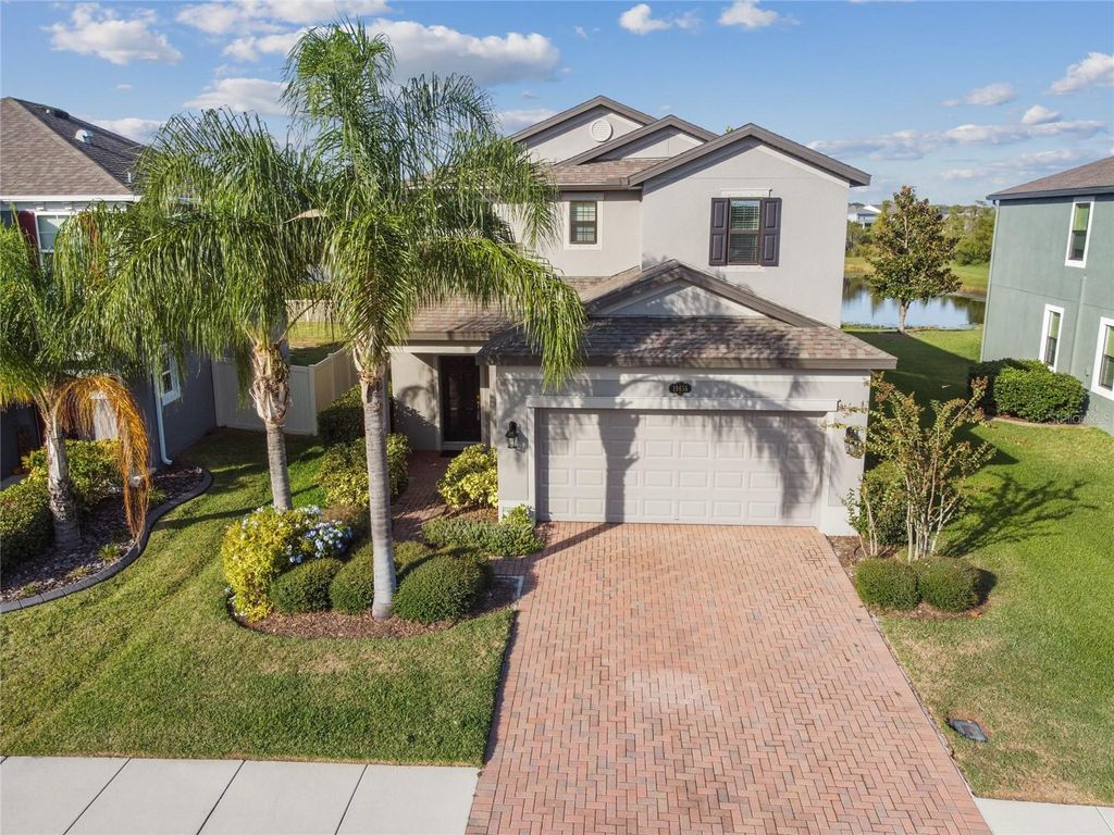 Photo of 19656 Long Lake Ranch Boulevard, Lutz, FL 33558 (MLS # TB8402224)