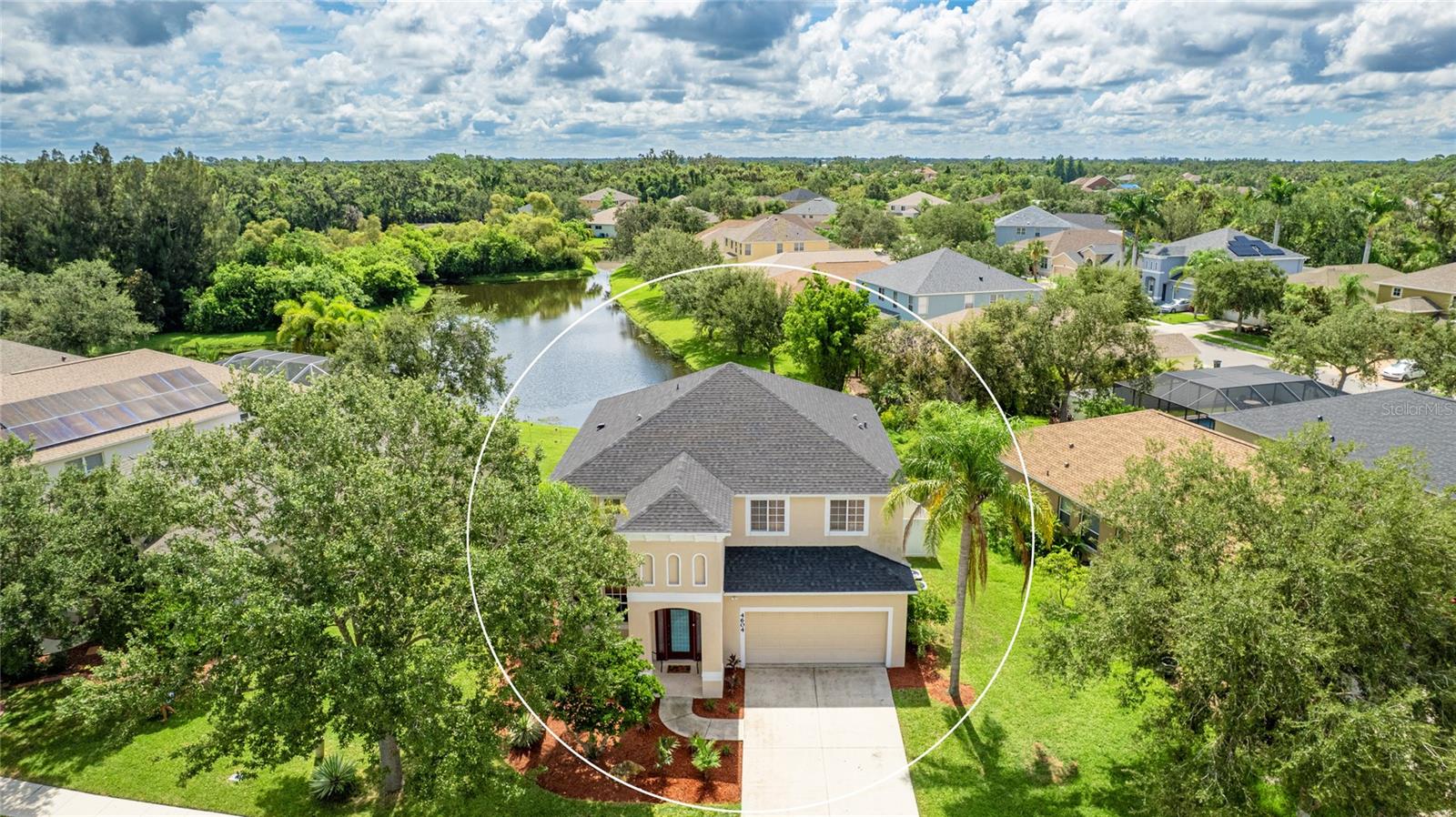 Welcome to your dream home in the quiet, serene, and family-friendly neighborhood of Covered Bridge Estates in Ellenton. This stunning 4-bedroom, 3.5-bathroom home offers just over 2,900 sq. ft. of beautifully updated living space, thoughtfully redesigned from top to bottom for modern comfort and style. Inside, you’ll find two spacious living areas, a dedicated laundry room, and an open-concept kitchen that serves as the heart of the home. Renovated in April 2025, the kitchen boasts custom cabinetry, a brand-new island, quartz countertops and backsplash, and all new stainless steel appliances, creating a perfect space for cooking and entertaining. The list of updates is impressive, beginning with a brand-new roof in October 2024 and a new water heater installed in 2024. Luxury vinyl plank flooring was added to the main level in April 2025, and the entire home was freshly painted in May 2025. Bathrooms have been completely renovated with new vanities, lighting, and vinyl plank flooring in July 2025. All toilets throughout the house were replaced in August 2025 as well as new light fixtures and ceiling fans have been installed throughout the home, enhancing both style and efficiency. The primary suite is a true retreat, featuring a completely remodeled master bath completed in July 2024 with quartz countertops, a rain shower, and a Bluetooth push-to-start shower system with automatic settings for a spa-like experience. Outdoors, the home’s curb appeal shines with brand-new landscaping completed in August 2025, and the backyard is made private and pet-friendly with a new fence installed in October 2023. Best of all, the property offers a breathtaking lake and private preserve view, providing the perfect backdrop for morning coffee or evening relaxation. Covered Bridge Estates offers outstanding community amenities, including a pool, clubhouse, fitness center, playground, and tennis courts, all while being conveniently located near shopping, dining, and I-75 for easy commuting. Completely move-in ready, this home has been meticulously updated so you can simply unpack and start living your Florida dream.