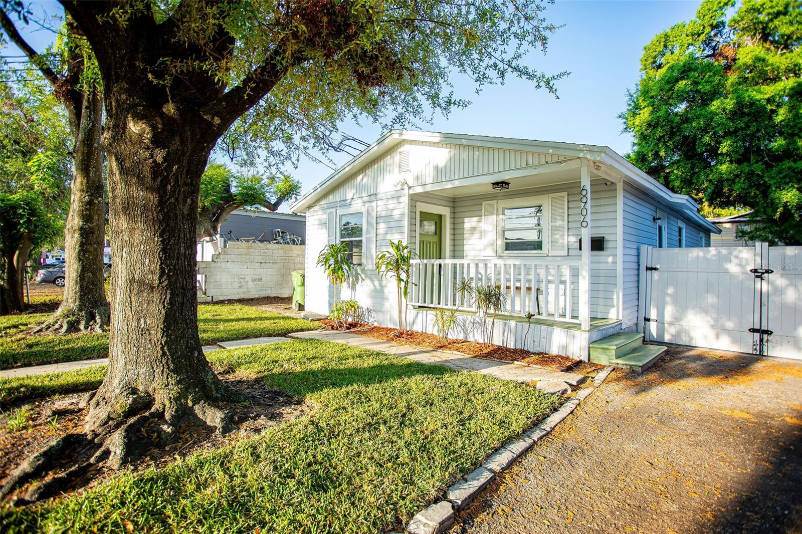 IMMACULATE BUNGALOW IN OLD SEMINOLE HEIGHTS! This tastefully remodeled 3 bed, 1 bath home features NEW, DURABLE LVP FLOORING, a FULLY-FENCED IN BACKYARD, NEW SOD & an abundance of NATURAL LIGHT pouring in from every angle! Your kitchen features NEW SHAKER cabinets with extra large, premium pulls, QUARTZ countertops, & STAINLESS STEEL APPLIANCES. Just off the kitchen is the door to your fenced-in yard w/oversize concrete pad, perfect for entertaining or parking your BOAT OR RV! Backyard features a small storage shed, CHICKEN COOP, & elevated entertaining deck. Enjoy your property on your terms with NO HOA in the HIGH & DRY East Tampa area-- no flood insurance required! Enjoy Peace of mind knowing that your major systems are all in great shape (ask your realtor for a copy of the inspection report attached on MLS): UPDATED ELECTRICAL & PLUMBING, HVAC (2022), ROOF (2019), & NEW, ENERGY EFFICIENT TANKLESS HOT WATER HEATER (2025). The combination of it's exceptional location & NO LEASING RESTRICTIONS, this home is PERFECT FOR AIRBNB and can be sold furnished. Conveniently located just off I-275, you're less than 10 minutes from Downtown Tampa, Waterstreet Tampa & Riverwalk, 15 minutes from Raymond James Stadium & St. Joseph's Hospital, 30 minutes from Clearwater & St. Pete Beaches. A short drive from the restaurants and breweries that have made Seminole Heights a premier destination for the city of Tampa. Take a VR tour and see for yourself today! <iframe width="853" height="480" src="https://my.matterport.com/show/?m=pXVyXSCxubq" frameborder="0" allowfullscreen allow="autoplay; fullscreen; web-share; xr-spatial-tracking;"></iframe>