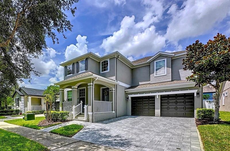Welcome home! This exquisite property located at Waters Edge at Lake Nona has 5 bedrooms and 3 full baths. The driveway has been redone with beautiful pavers, that leads to a relaxing front porch. Oh! There is a Pond right across the street 3 acres large with a gazebo and a trail around it, great way to get your steps and meet the neighbors. Thru the front door we go and arrive to the Large Living room and Dinning room with super high ceilings, 17 feet high, Hollywood style, designed to hang your work of art. From there you can continue towards the family room and kitchen, excellent gathering place for the family and friends. The kitchen sports a breakfast/lunch bar and a side dinette area that leads to the back porch and backyard. The kitchen has plenty of cabinets and a nice size pantry and between the kitchen and dinning room your own Butlers pantry. Past the family room is the 5th or guest bedroom flanked by a full bathroom. Moving back to the stairs we reached the second floor. The Loft/bonus room is awesome. Perfect for the Home theater enthusiast. Past the Loft is the large primary suite with also a large Bathroom with separate shower and garden tub, his and hers sinks. 3 more large bedrooms, 1 bathroom, and the laundry room complete the 2nd floor. The Backyard is ideal for those family gatherings and big enough to add a pool if so desired. Amenities in the neighborhood are awesome: POOL, Tennis courts, basketball courts, YMCA membership, Boat ramp and access to the lake. Lake Nona Medical City is Centrally located, close to downtown, airport, beaches and park attractions. USTA National Headquarters is here. Excellent Golf courses are here too. Hospitals ? The Lake Nona VA, Orlando Health, Advent Health, UCF Hospital, Nemours Hospital, and more to come. A variety of restaurants, gathering places, entertainment, shopping, hotels, and still growing. Come and tour this home today and make it yours.