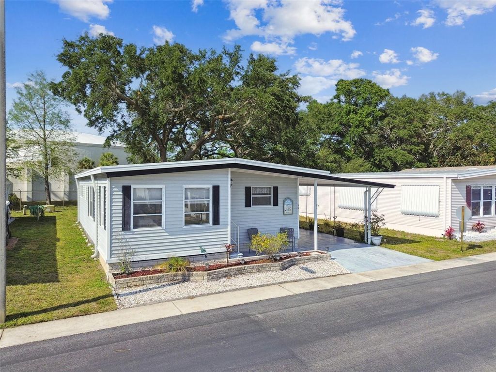 Photo of 66 Royal Palm Circle, Largo, FL 33778 (MLS # TB8373489)