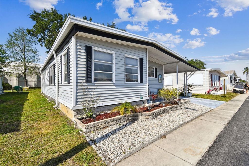 Photo of 66 Royal Palm Circle, Largo, FL 33778 (MLS # TB8373489)