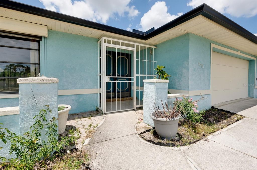 Photo of 3213 Pellam Boulevard, Port Charlotte, FL 33948 (MLS # N6144179)