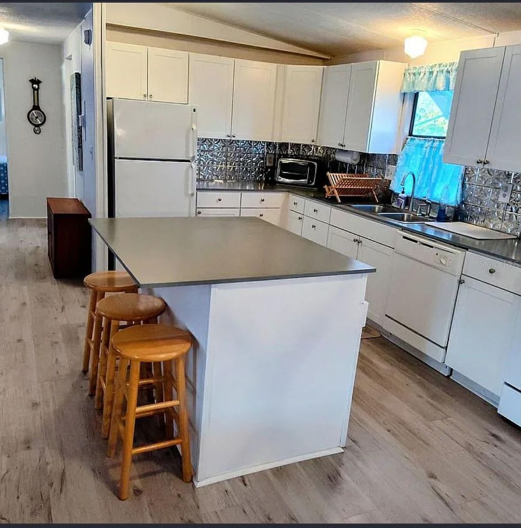 Photo of 831 River View Lane, Tarpon Springs, FL 34689 (MLS # TB8468596)