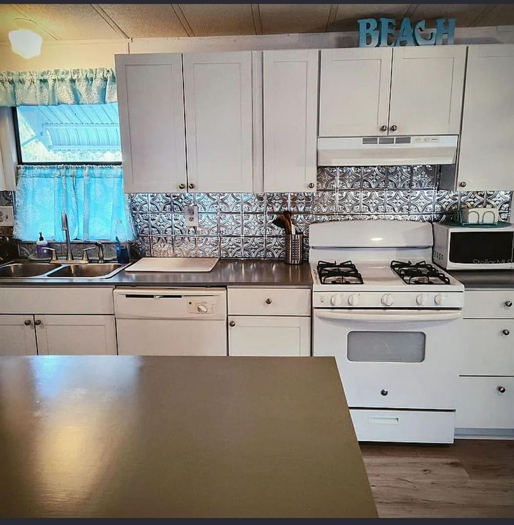 Photo of 831 River View Lane, Tarpon Springs, FL 34689 (MLS # TB8468596)