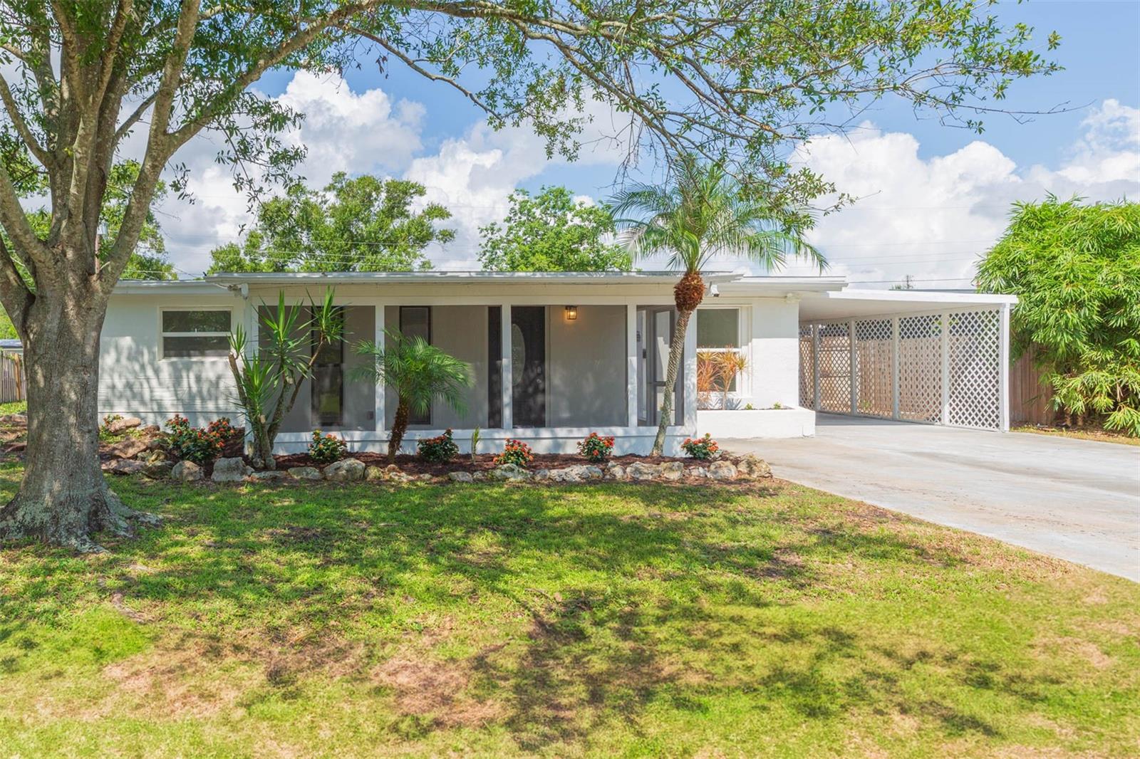 One or more photo(s) has been virtually staged. Welcome to 5640 Cedar St NE, a beautifully renovated home just minutes from Downtown St. Petersburg, vibrant waterfront parks, dining, shopping, and the beaches. Conveniently located near 4th St N, I-275, and Gandy Blvd, you’ll enjoy easy access to Tampa, Clearwater, and all of Pinellas County’s attractions.
This move-in ready home has been completely remodeled inside and out—including brand-new floors, modern bathrooms, a sleek kitchen with quartz countertops and stainless steel appliances, a new roof, air-conditioning system, and fresh interior/exterior paint. The open-concept living area is filled with natural light and features polished tile floors, recessed lighting, and a statement stone accent wall that adds a touch of luxury.
The kitchen boasts soft-close cabinetry, black hardware, and contemporary finishes, making it a chef’s delight. Both bathrooms are fully updated with designer tile work, new vanities, and modern fixtures. Two bedrooms feature private outdoor access, perfect for guests, extended family, or potential rental opportunities.
The exterior offers a spacious driveway with covered parking, a screened front patio, and a fenced backyard with room for outdoor living.
Nearby Attractions & Lifestyle include being less than 10 minutes to Downtown St. Pete (restaurants, nightlife, and the Pier), 20 minutes to St. Pete Beach & Treasure Island, quick access to I-275 & Gandy Bridge for commuting to Tampa or Clearwater, bering close to shopping centers, schools, parks, and waterfront trails.
This property combines modern updates, income potential, and a prime location—making it ideal for a full-time residence, vacation retreat, or investment opportunity.
