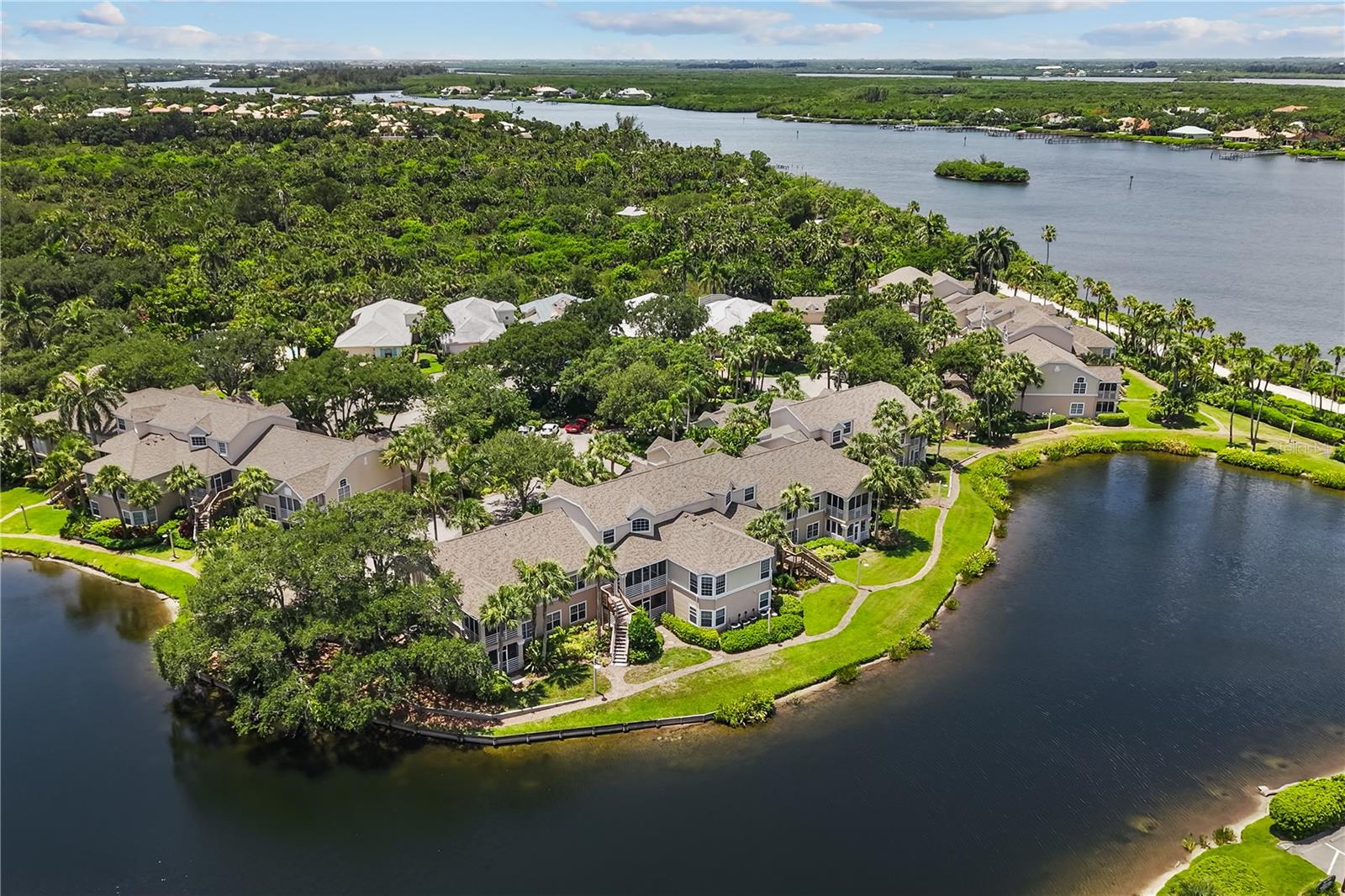 Enjoy private tropical resort lifestyle in this rarely available 2 story Lakeside Villa. Water and treehouse views in this completely renovated 3BR / 2.5 BA ocean to river Sea Oaks’ condominium. Enjoy spectacular natural light with volume ceilings and expansive windows. Wood floors, glass enclosed balcony, large 2 car garage. Second floor guest area perfect for the grandchildren. Active racquet club with 16 Har-Tru courts, Pickleball and Fitness Center. Oceanfront beach club with restaurants, pool, jacuzzi and private beach access. Enjoy sunsets at the marina and walk or bike the Historic Jungle Trail. Experience coastal living with nearby cultural, golf and seaside activities. Available furnished or unfurnished.
