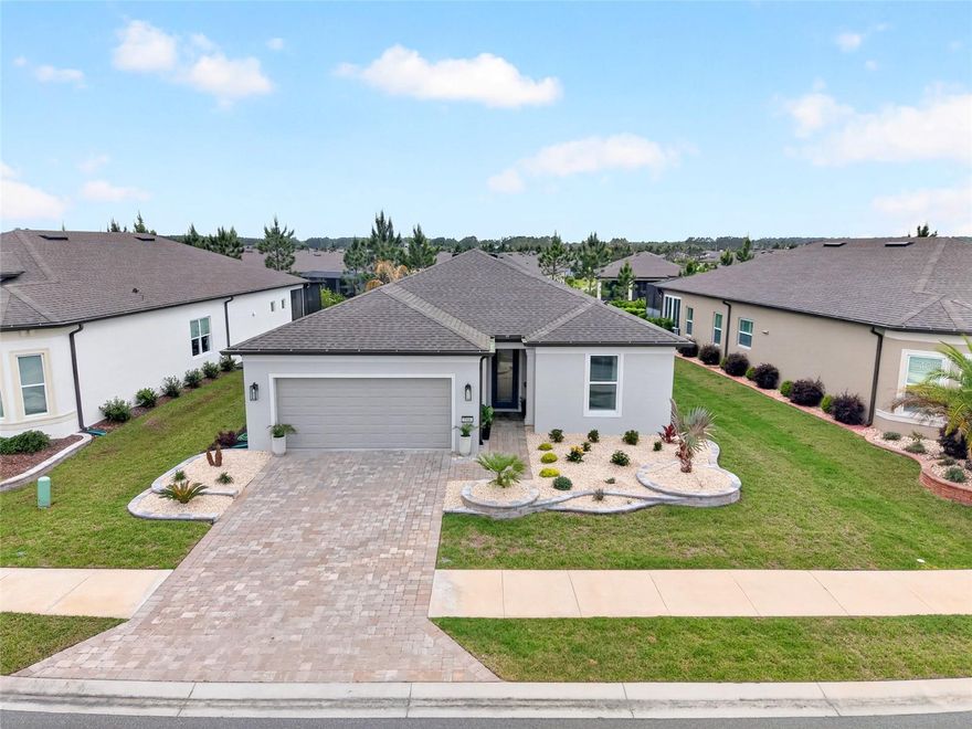 2023 Mystique model located in the coveted Stone Creek community offers the perfect blend of modern design and resort-style amenities------2025 UPGRADES:  **914 sq ft pavered area with screened enclosure   **12x26 in-ground gunite chlorine pool with waterfall  **624 sq ft paver driveway    * Updated fans, light fixtures & mirrors in bathroon  *Exterior Paint  * Glass insert in front door  --------INTERIOR FEATURES:  2 bedrooms, 2 bathrooms, plus Flex Room.  Modern finishes including quartz countertops in kitchen & bathroom, counter top cook top & built in oven & microwave, 42-inch kitchen cabinets, a large island & soft close drawers.  All complemented by tile flooring and abundant natural light throughout the home. The owner’s suite provides a private retreat with a walk-in closet, dual vanities, and a walk-in shower.  2023 Air Conditioner---------EXTERIOR FEATURES:  Concrete block construction 2023 Roof,  Low maintenace curb appeal, 2 Car Garage ,  paver driveway, attractive landscaping, and a 2-car garage.  Huge covered back patio with ceiling fan--------COMMUNITY FEATURES:  Del Webb Stone Creek  is true resort lifestyle with 60,000 sq ft clubhouse complex, reunion center,  Catering/demo kitchen, Library / reading room, Card room, billiards room, game room, Arts & crafts studio, Movie theater / activity rooms, On-site retail + café/restaurant, State-of-the-art fitness center, Aerobics & dance studio, Indoor lap pool, Outdoor resort-style pool , Indoor & outdoor spa / hot tubs, Steam room / sauna, Massage & wellness services, Locker rooms , 18-hole golf course + practice facilities, Tennis courts, Pickleball courts, Bocce ball courts, Horseshoe pits, Softball/baseball Walking & biking trails, Scenic lakes & ponds, Fishing lakes / pier (catch & release) ,Parks & natural green space, Picnic areas, Dog park, RV Storage and NUCH MORE !!----- CALL TODAY WITH QUESTIONS OR TO SCHEDULE A SHOWING.