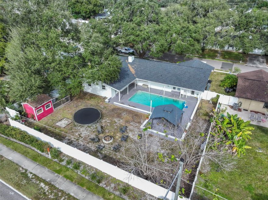 Location, charm and comfort are timeless. This home has it all. Double front doors open to the formal dining and living area with wainscoting. Continue through the arched hallway entrance into the open family room plan that features a wood-burning fireplace designed with millwork and granite trim. Adjacent is a fully equipped kitchen with large kitchenette, breakfast counter, built-in desk, additional cabinets and chalkboard wall. Spacious bedrooms are off the family area. Family and kitchen areas provide access to the expansive outdoor pool patio, as well as an outdoor shower. Entertain outside under the separate covered gazebo with a yard that has ample room for any outdoor activity you’re seeking. The neighborhood has access to a picnic/recreation area on Lake Orienta, allows fishing, skiing and other water sports. Home is within a short distance of many other amenities, shopping, medical services, expressways and quaint shops.  Schedule your tour now to get to know all the other features this wonderful home has. Information provided upon request.