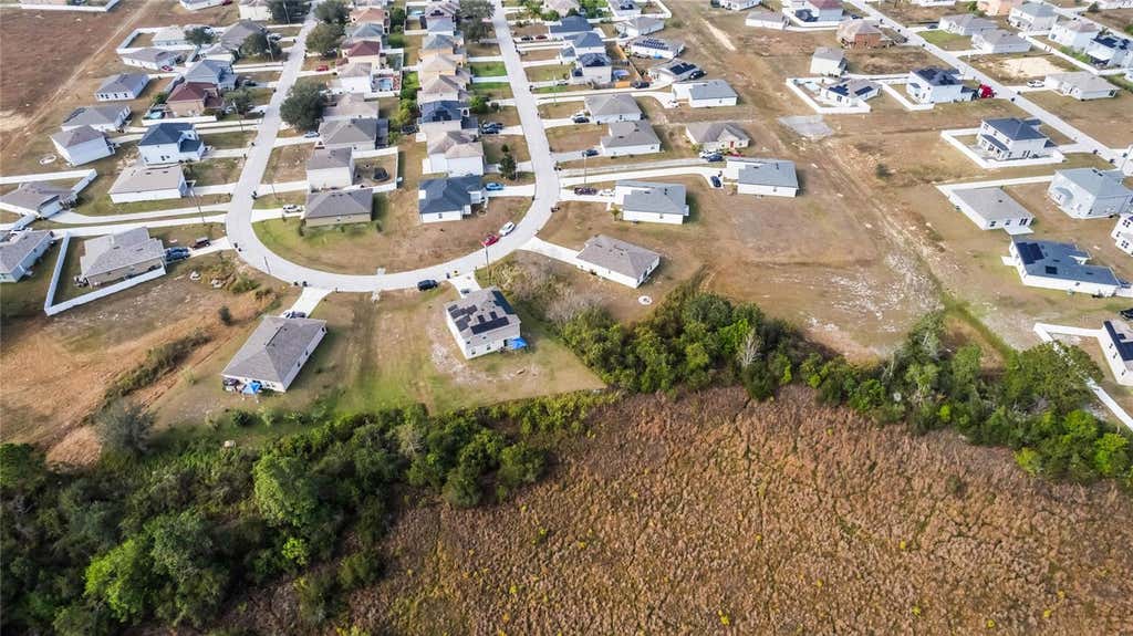 Photo of 2159 Rio Grande Canyon Loop, Poinciana, FL 34759 (MLS # O6432703)