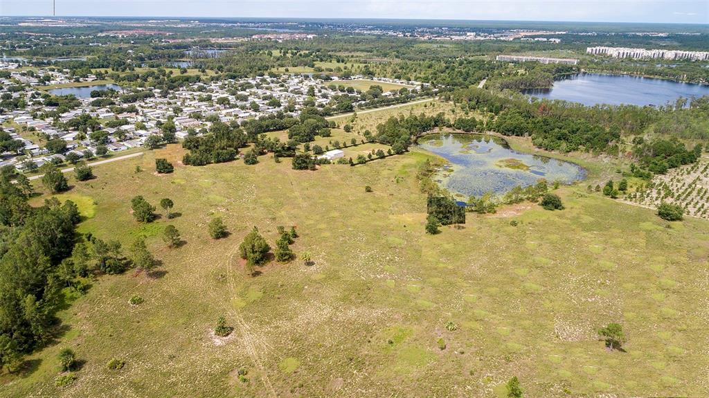 Rare found, prime development opportunity in the hot Horizon West area. Total 9.09 acre. High and dry. No wetland on the property. Perfect rectangular shape. All surrounding lands have been fully developed by major builders in this area already. Right out of the gate of DisneyWorld. Right next to the booming Disney Flamingo Town Center where Disney has built a 200,000-square-foot retail center which hosts 1500 hotel rooms, 50+ shopping, dinning, banks and hospitals including Target, Walgreens, Starbucks, Avent Health Center, Disney University Program, etc. Bring your builder here where it might become the second Disney Springs in next few years! Clean title/No liens. Not village incorporated yet. Parcel has 30 greenbelt TDR credits. County allows up to 64 units to be built. Plot map, conceptual site plans, updated survey, dual intelligence reports available with conditions. PD is in process.