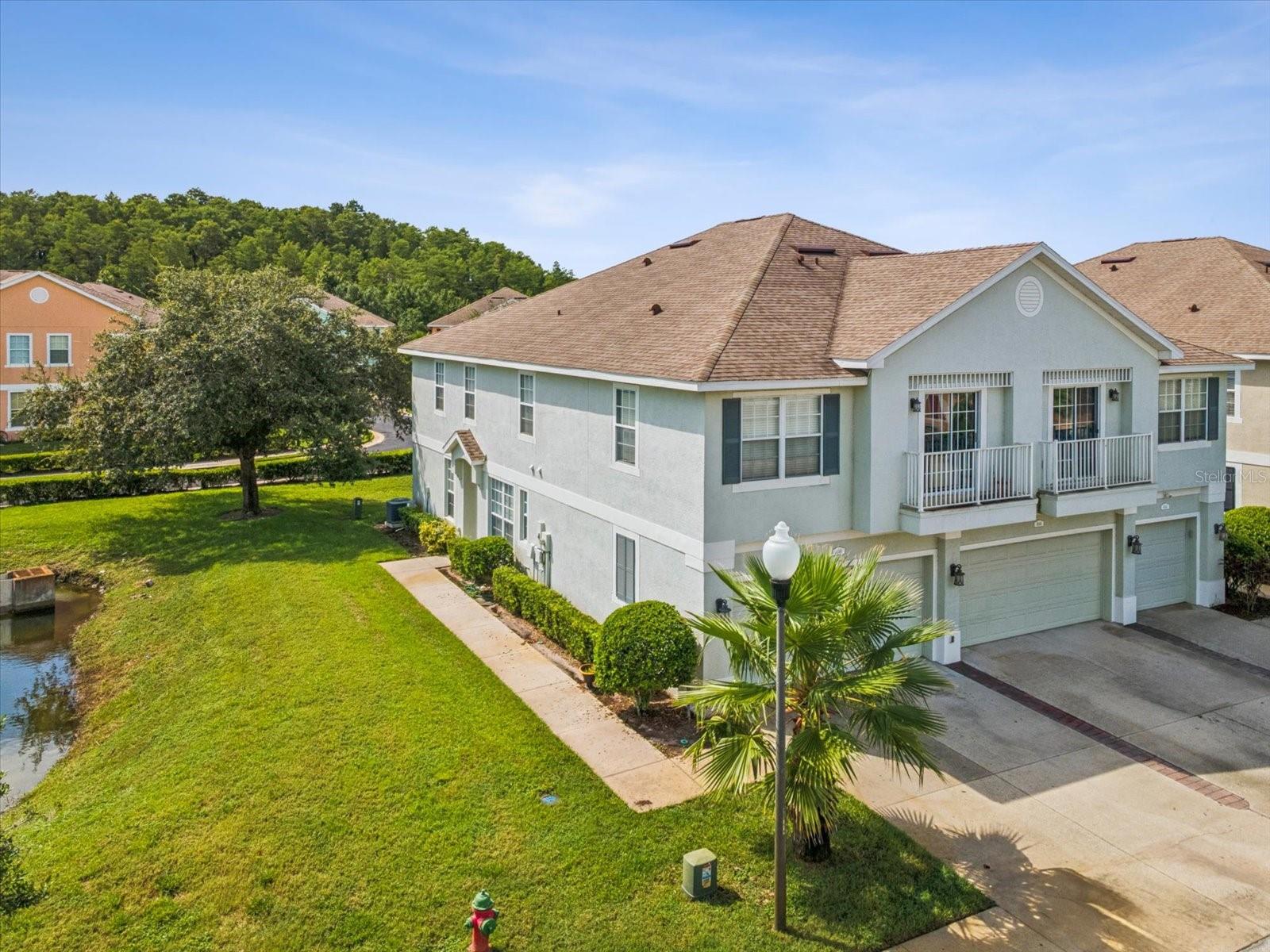 Welcome home to this beautiful townhouse in the neighborhood of Little Creek! This is the ideal location, close to the Veterans Express way, Tampa International Airport, Trinity hospital, and many restaurants and shopping options! This spacious 3 bedroom, 2.5 bath and 2 car garage home is extra special as it’s on a corner lot with much more privacy! The house boasts lots of natural lighting with two big, front windows, no carpet downstairs in the living space, and an open and inviting kitchen! Upstairs has the three bedrooms, including the master with an en-suite bathroom and walk in closet. Little Creek has low HOA fees which include exterior maintenance, community grounds, pool maintenance, water, trash and sewer. This move in ready, low maintenance living home is ready for its next owner! Schedule your showing today!