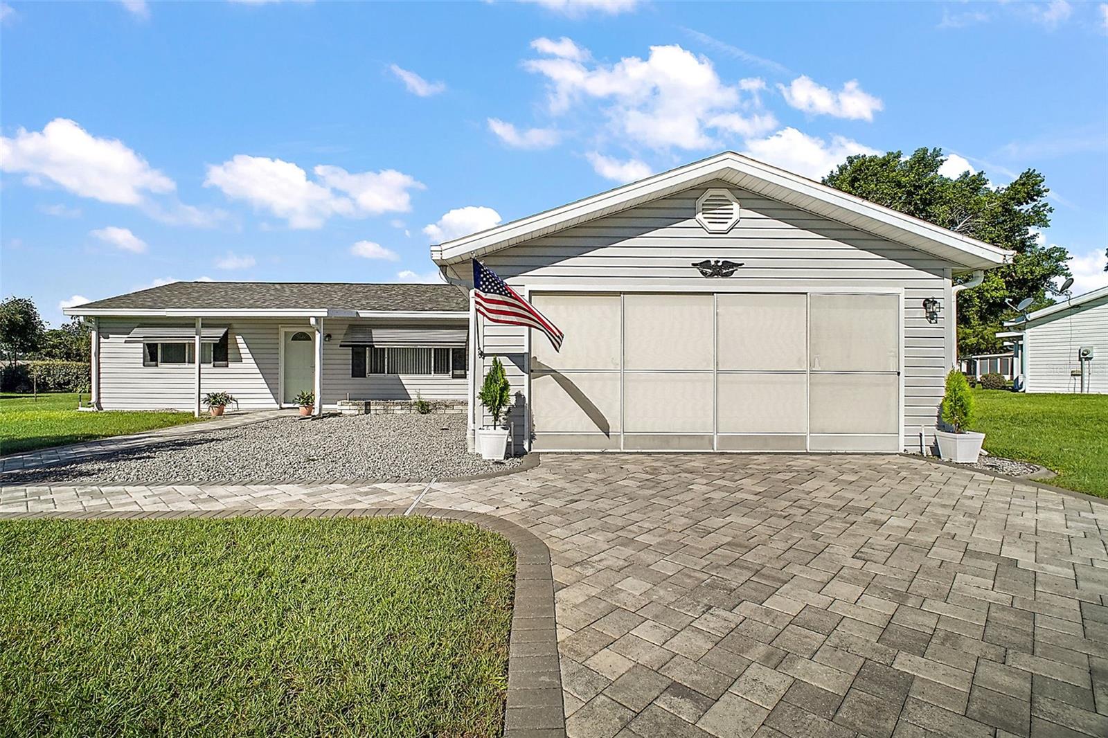 Welcome to your new home! This 2 bedroom 2 bath home has great curb appeal with brick paver drive and sidewalk. Roof June 2025, HVAC 2021, Hot Water Tank 2023, doors and storm door replaced 2024. Well maintained Chestnut 2 model in popular Spruce Creek South. The kitchen has been upgraded with stainless steel appliances, cabinets have been painted and counter tops have been painted to look like marble. Split bedrooms with upgraded ceiling fans and spacious walk in closets. Ceramic tile throughout for easy maintenance and great for your furry friends! Up graded Master bath includes walk in shower with ceramic tile surround, new toilet and dual sink vanity. Large living and dining area also has been updated with new ceiling fan / light fixtures. Large enclosed Lanai with sliding windows to enjoy cooler nights. A spacious 2 car garage with shelving and additional storage as well as sliding privacy screen. Don't miss out on this beautiful remodeled home! Call today to schedule private showing.