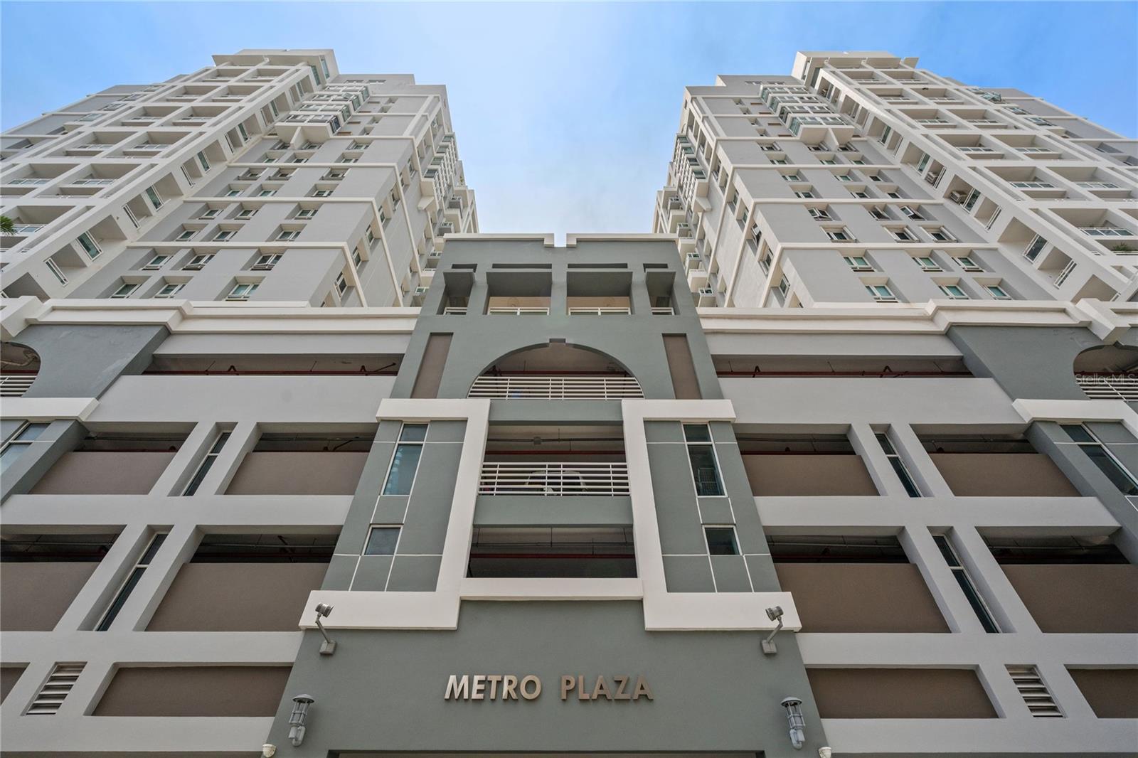 Experience the vibrant downtown lifestyle of Santurce's Art District while enjoying stunning views of the Condado Lagoon and the Atlantic Ocean from this unique, fully furnished condo with many West Elm pieces at Metro Plaza Towers. With 1600 square feet of open living space, this modern and stylish condo includes 2 bedrooms, 2 bathrooms, and 2 garage parking spaces equipped for electric vehicles. Amenities include remote-controlled storm shutters, high-speed 2000 Mbps fiber internet, smart Lutron Caseta dimmer light switches, and three inverter air conditioners. The building offers comprehensive amenities such as 24-hour concierge and security services, a gym, a heated pool, a full-power generator, a water cistern, and a clubhouse. Additionally, residents have access to public parking for guests, two on-site restaurants, and a hair salon. Enjoy the renaissance of Santurce with renowned new restaurants, like Pícara and Ombra, boutiques, beauty salons, theaters, galleries, museums, and La Placita de Santurce itself and immerse yourself in the artistic and cultural heartbeat of the island