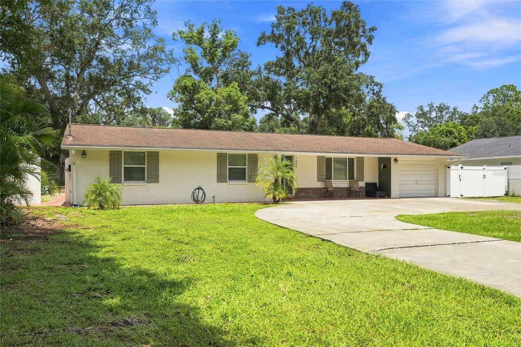 Photo of 1909 W Hanna Avenue, Tampa, FL 33604 (MLS # TB8540967)
