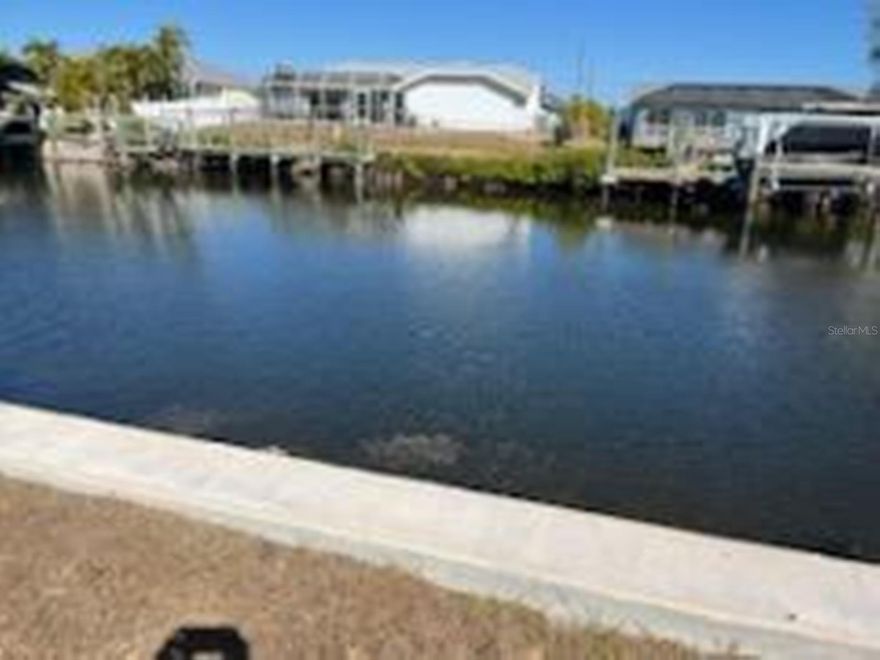 Build Your Dream Home on This Gulf-Access Waterfront Lot! Rare opportunity to own a prime waterfront vacant lot with a seawall that has Gulf access. This spacious homesite is perfectly positioned for boating enthusiasts, offering quick and easy access to open water. Enjoy serene water views, stunning sunsets, and the ultimate Florida lifestyle right from your backyard.