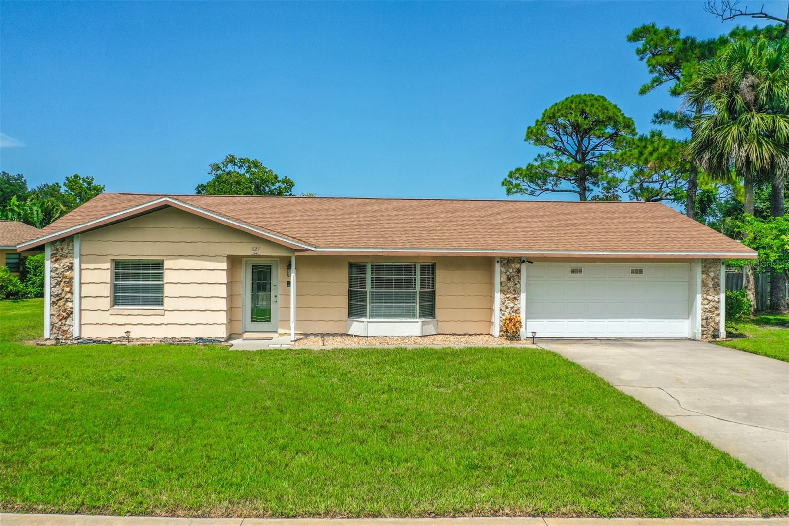 When location matters, you've found your new home!? This awesome 3-bedroom, 2-bath home is located in Countryside on a quiet circle. That's right—no HOA fees! Bring your boat or trailer—there's plenty of room to park it in the backyard. This move-in-ready home features a brand new roof (2017), Air Conditioner replaced in 2022, Air Conditioning Ducts replaced in 2023, and Water Heater replaced in 2022. The floor plan has been customized to provide the spaciousness you've been searching for. The master suite offers a wonderful walk-in closet and a private renovated bathroom with a walk-in shower. You'll love the large utility room with space for a washer, dryer, and extra storage. The Florida room is full of natural light—perfect for relaxing or entertaining. Enjoy the oversized fenced backyard! There's also a two-car garage with plenty of room for storage. This home is located near top-rated schools. You're just minutes from shopping, great restaurants, and more.