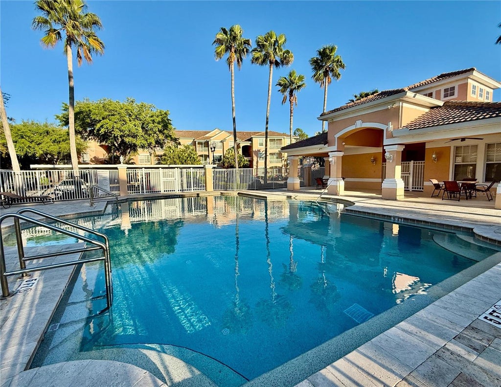 Photo of 13572 Turtle Marsh Loop #212, Orlando, FL 32837 (MLS # TB8530621)