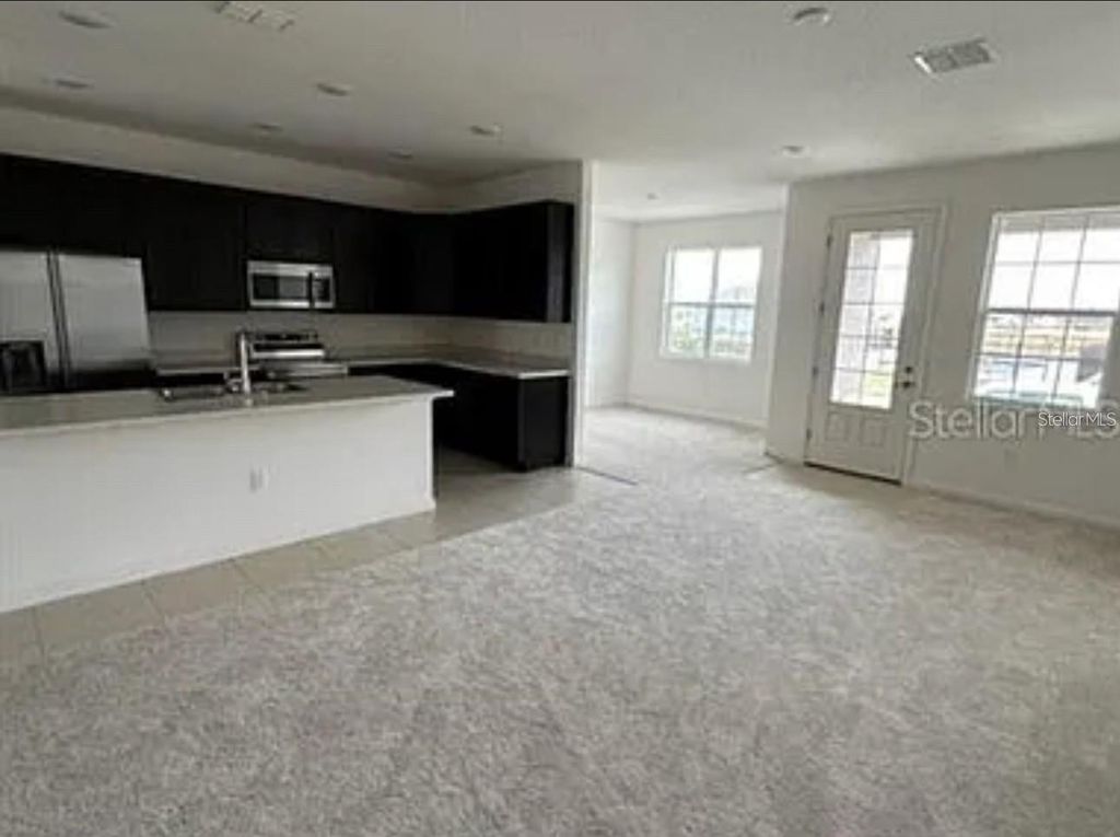 Photo of 234 Bella Preswick Boulevard, Davenport, FL 33837 (MLS # O6382599)