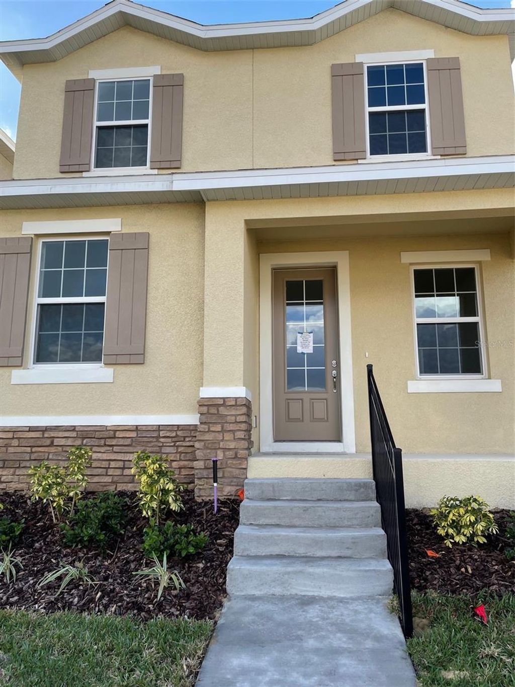 Photo of 234 Bella Preswick Boulevard, Davenport, FL 33837 (MLS # O6382599)