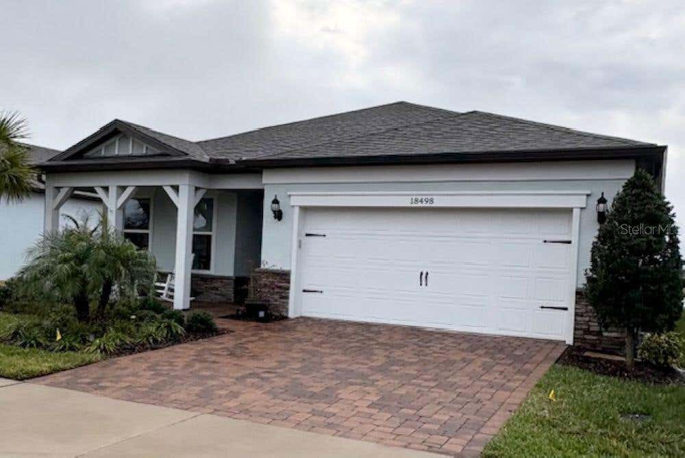 Photo of 18498 Coastal Shore Terrace, Land O Lakes, FL 34638 (MLS # O6431893)
