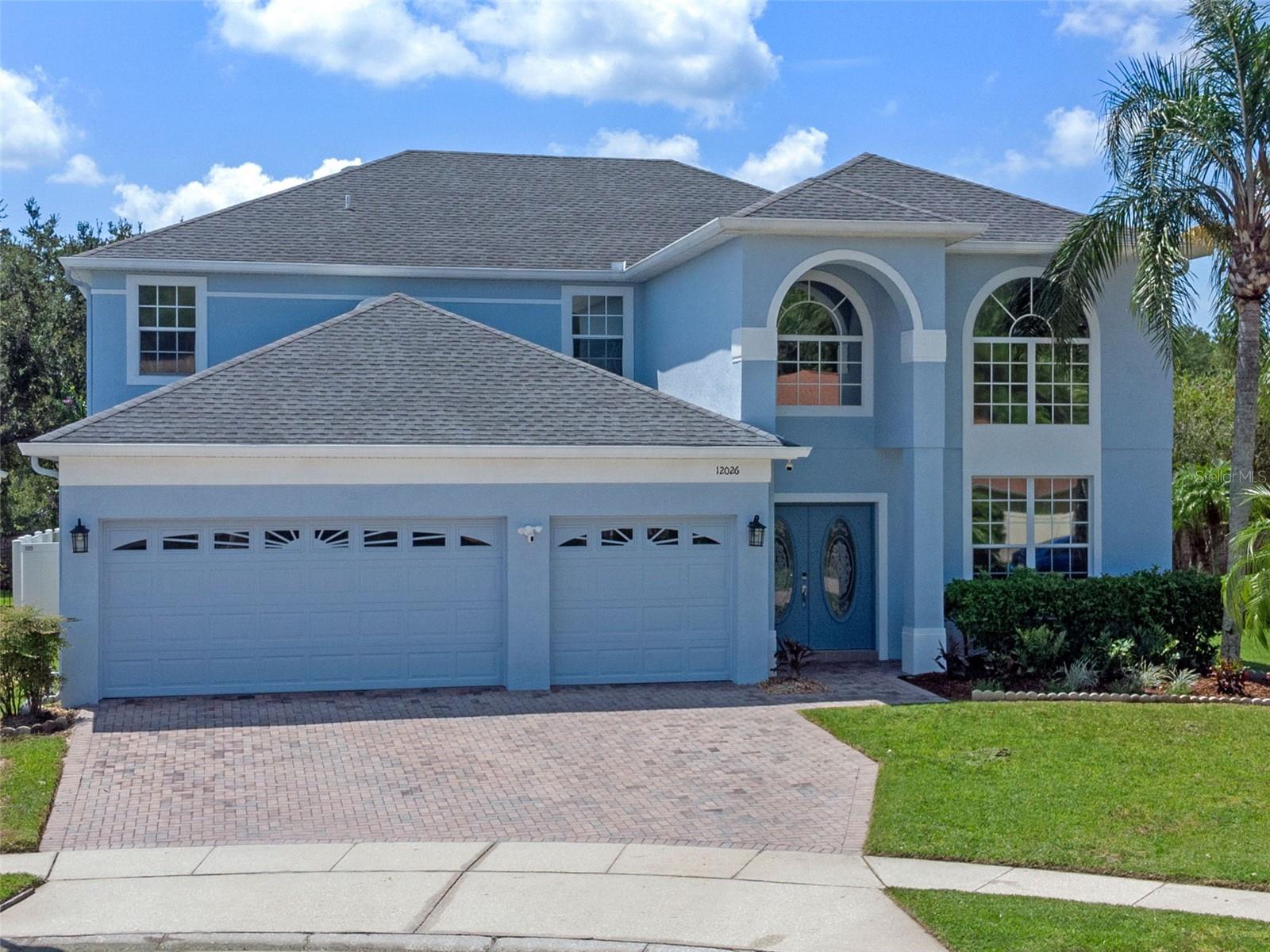 REMODELED 5 Bedroom 4.5 Bathroom + Saltwater Pool + Loft + 3 Car Garage on a Cul-De-Sac with 3,450+ square feet of living space in the Cypress Pointe neighborhood of Cypress Springs II. ROOF 2020. Walking through the front Double Door Entrance into the foyer you are met with soaring high ceiling, a split staircase leading upstairs and across the bottom floor, with plenty of natural light spilling in from the windows into a formal living and dining room space. The kitchen has been FULLY REMODELED with white cabinets, granite countertops, Brand New Stainless Steel Appliances, recessed lighting featuring an island that opens to the living room. Through the Triple Glass Sliders in the living room you step onto the freshly painted Fully Screened in Saltwater Pool Deck. The Pool Deck has plenty of space for entertaining, and the backyard is fully fenced in with brick and white vinyl fencing that would be perfect for anyone with dogs. The primary bedroom is the only bedroom downstairs, which sits in the rear of the home with his & hers walk in closets. The primary bathroom has also been REMODELED to include separate granite topped vanities with white cabinetry, a garden tub and walk in shower. Traveling up the split staircase you are led to a very large loft space which is perfect as an upstairs living room that separates all bedrooms. In the middle of upstairs is a full bathroom with a dual vanity that separates two full bedrooms. On both ends of the upstairs is a bedroom that features a full bathroom en suite. This home can accommodate privacy for very large families, and is an option for multigenerational living! Community amenities for Cypress Springs II include a Community Pool & Playground just a short drive down Cypress Springs Parkway, with plenty of biking and running trails throughout the community. Make an appointment to see this home today!
