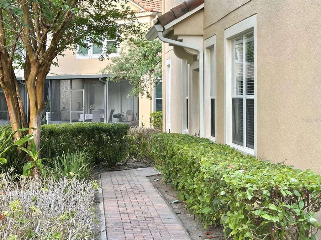 Photo of 6396 Daysbrook Drive #101, Orlando, FL 32835 (MLS # O6403925)