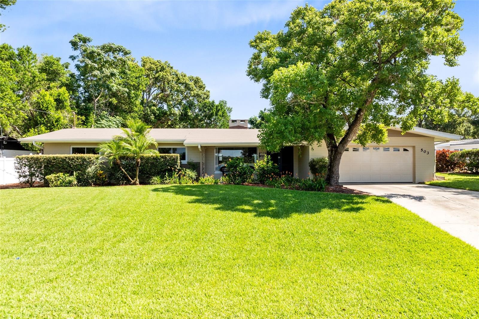 Welcome to 503 Lake Shore Drive in beautiful Maitland – where charm meets modern updates in a prime central location!
This beautifully updated home is nestled across the street from scenic Lake Faith and offers a rare combination of character, functionality, and thoughtful renovations — all with no HOA.
Step inside to discover an inviting open-concept floor plan featuring luxury vinyl plank floors throughout, a wood-burning fireplace with a brick mantle in the Living room, and built-in shelving in the family room & office that adds both charm and endless storage AND decor options. The versatile bonus room overlooks the expansive backyard and is perfect as a home office, playroom, or hobby space. A breakfast bar off the dining room makes entertaining easy, and the kitchen, remodeled in 2023, showcases modern finishes and plenty of cabinet space.
Both bathrooms have been tastefully updated (master bath in 2020, hall bath in 2023) and the home’s major systems are already taken care of, including HVAC & ductwork (~2016), plumbing (2019), windows (2014), hot water heater (2024), roof (2023), and a newer electrical panel — offering peace of mind for years to come. The 2-car garage is more like a tandem 3-car, it is so large!
Outdoor living is equally impressive with a charming front porch and a large screened back porch with beautiful wood ceilings, perfect for relaxing or hosting gatherings. The huge, fully fenced backyard features an irrigation system and fire pit, providing endless space for play, pets, or even a future pool. An oversized garage adds extra storage and parking flexibility.
Situated in a sought-after Maitland location close to major highways, shopping, dining, and top-rated schools, this home offers the best of convenience and comfort — don't miss out!