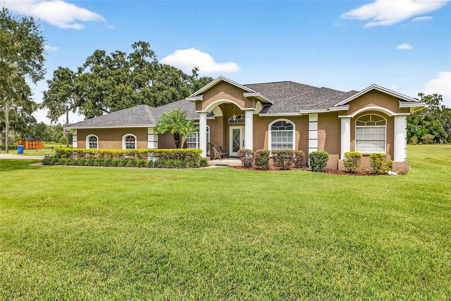 Beautifully updated and set on over 1.5 acres, this 4 bed, 3 bath pool home blends modern lifestyle with country living. 

Enter through custom glass doors into a foyer overlooking the formal living and dining room. 

With soaring ceilings and natural light you’ll enjoy pool views from nearly every room In this home. 

The open kitchen and dining area overlook the picturesque yard and pool through custom bay windows, while the family room features a fireplace with built-in shelving and sliding glass doors to the patio.

The split floor plan places the primary suite on the east side of the home with a large bathroom, dual closet, and private pool access. 

At the front of the home, you’ll find a spacious office with built-in shelving.
And three additional bedrooms can be found on the west side of the home.
Two share a full bath, while the third has its own private en suite bath with access to the pool area for convenience. 

Indoor laundry is conveniently located between the kitchen and the two car garage.

Updates include: Roof & HVAC (2023), water heater (2020), extended septic drain field (2023), updated electrical panel with generator hookup, and new carpet in the master (2025). The PebbleTec pool (lifetime warranty) is complemented by new screens and pool pump. 

A large shed with matching roof, walled storage, and covered parking adds flexibility. 

While the wide-open acreage fully Irrigated lawn pristine Saint Augustine grass and mature landscaping, create the feeling of a private retreat. 

With locally grown produce, Family operated restaurants and Antique shops and good old-fashion country living with city convenience.

Just 20–30 minutes from downtown Tampa, with easy access to I-4 and I-75 for quick trips across the bay or to Orlando proximity to “A-rated” Strawberry Crest IB High school.